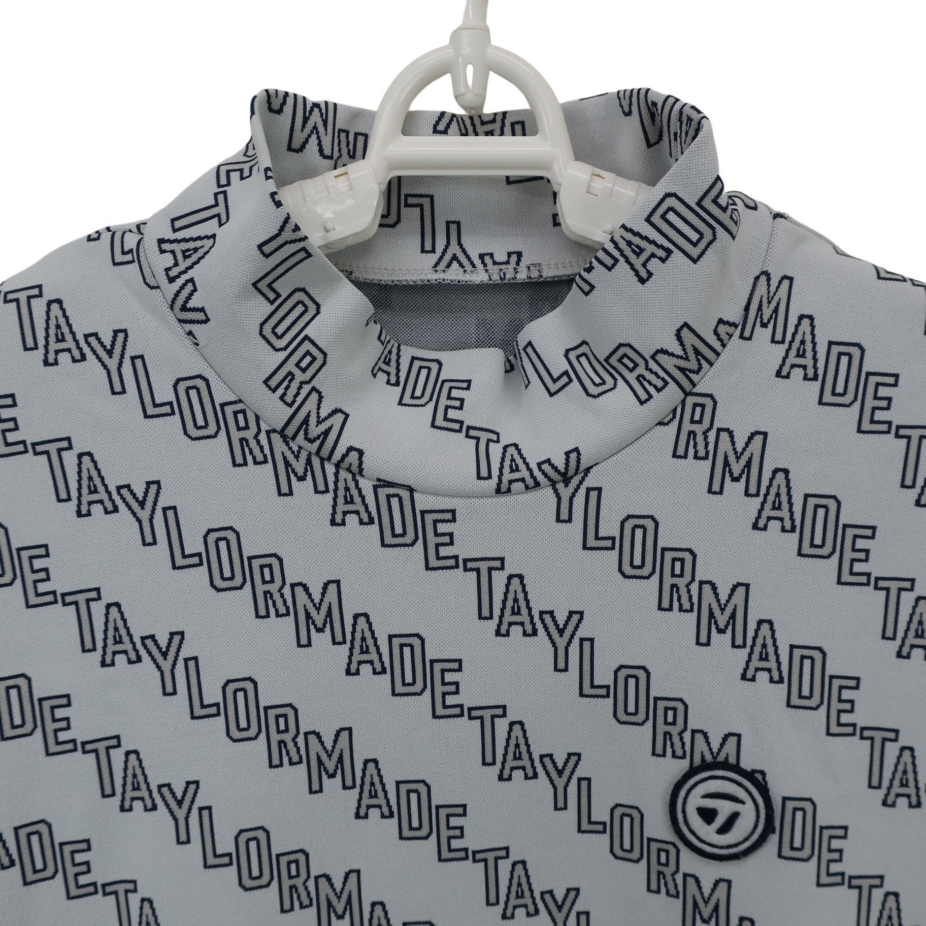 TaylorMade(テーラーメイド) 長袖モックネックシャツ グレーロゴ文字柄 レディース M A