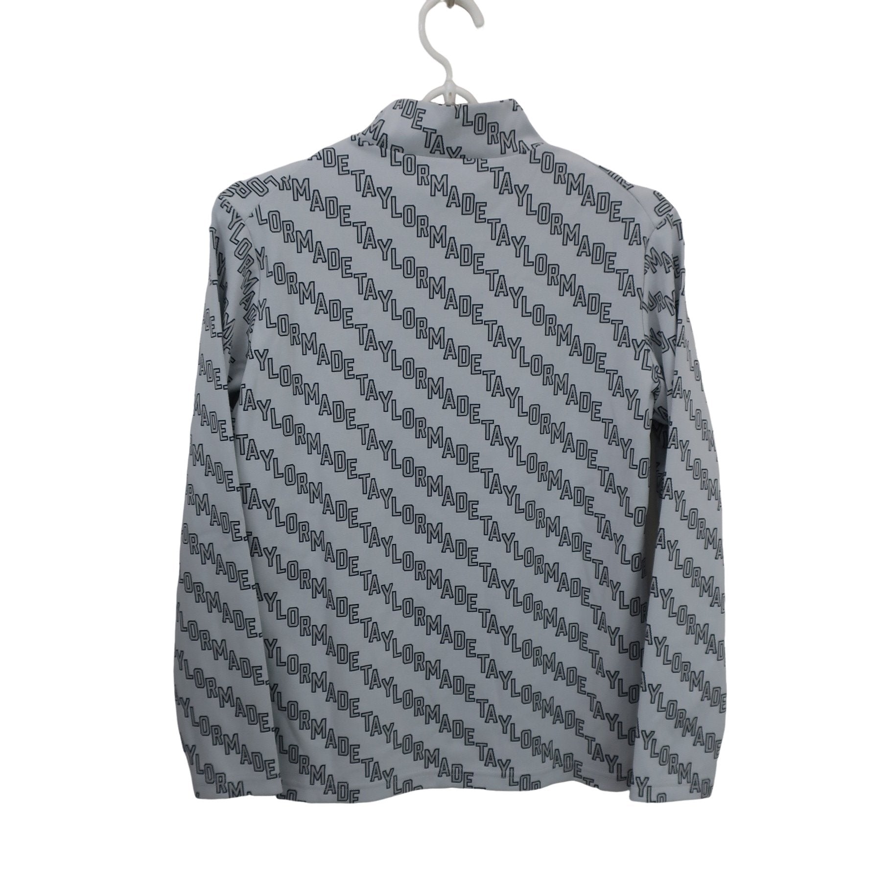 TaylorMade(テーラーメイド) 長袖モックネックシャツ グレーロゴ文字柄 レディース M A