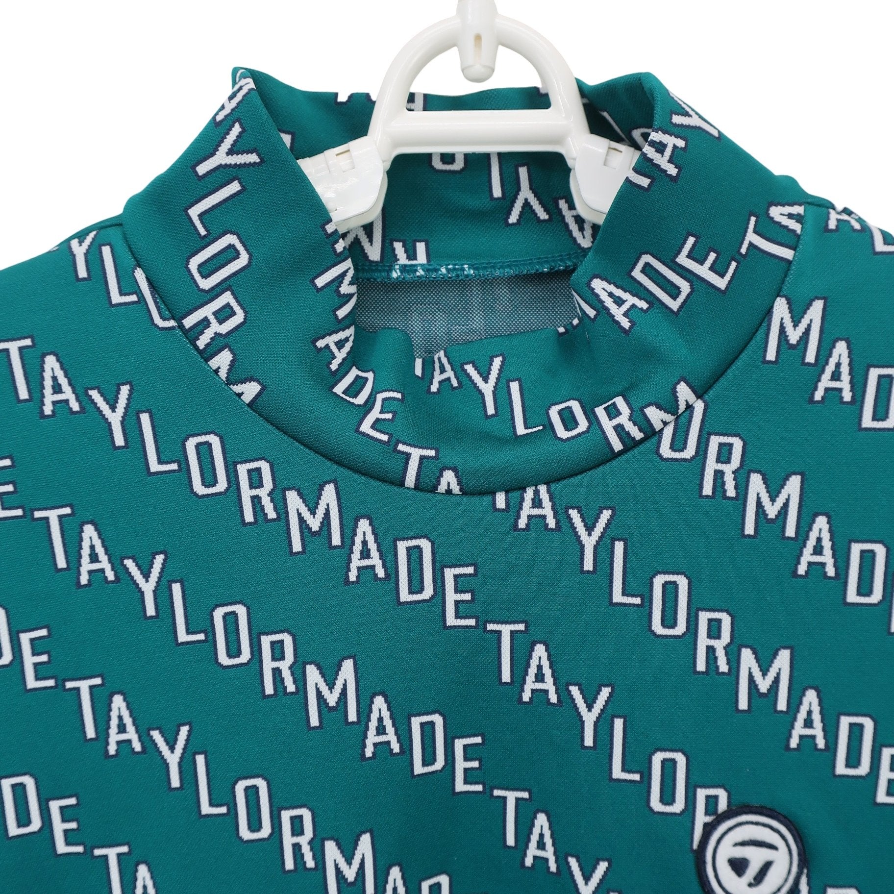TaylorMade(テーラーメイド) 長袖モックネックシャツ 緑ロゴ文字柄 レディース M A