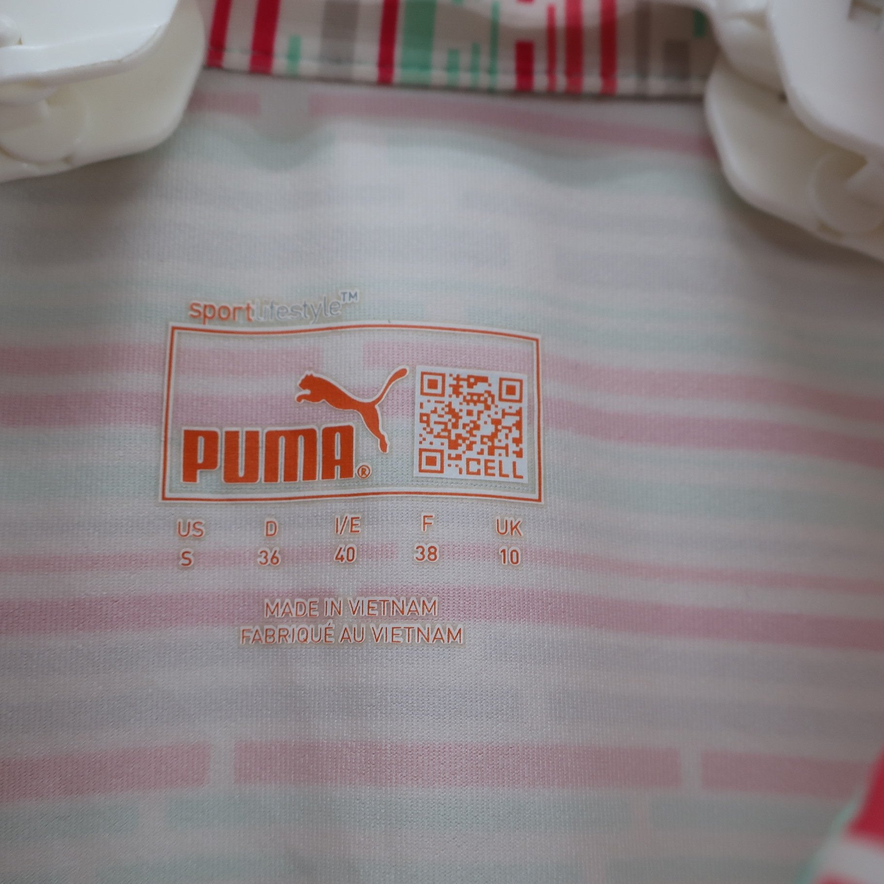 PUMA GOLF(プーマゴルフ) ポロシャツ 白ピンク黄緑総柄 レディース US S B