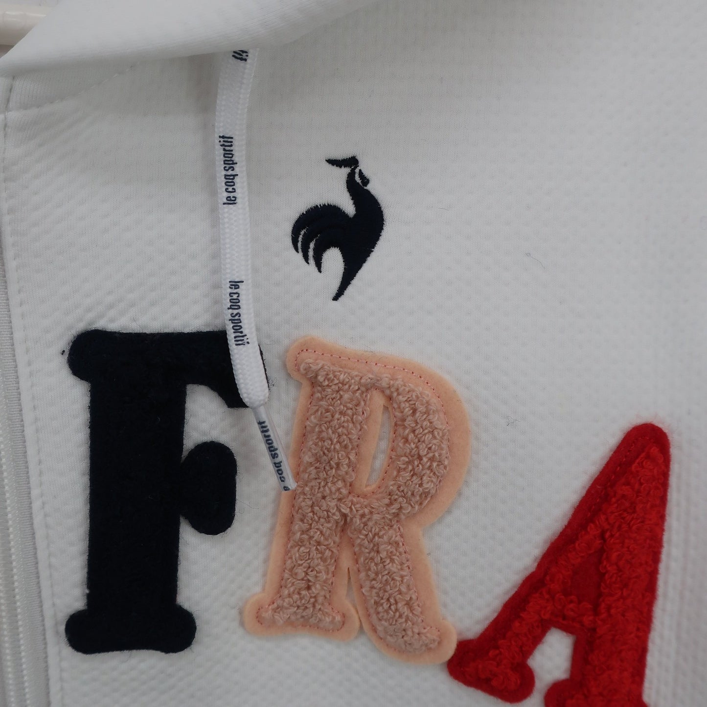 le coq sportif(ルコックスポルティフ) パーカー 白 レディース M A