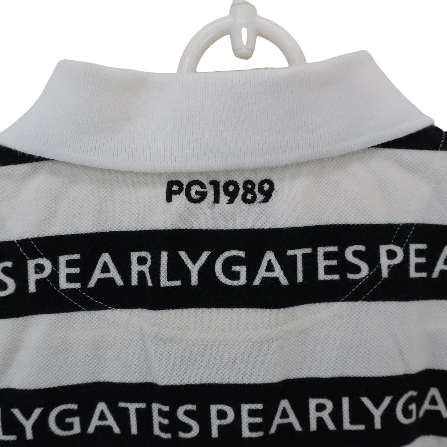 PEARLY GATES(パーリーゲイツ) ポロシャツ 白ネイビーロゴ文字柄 レディース 0 055-0260806 A