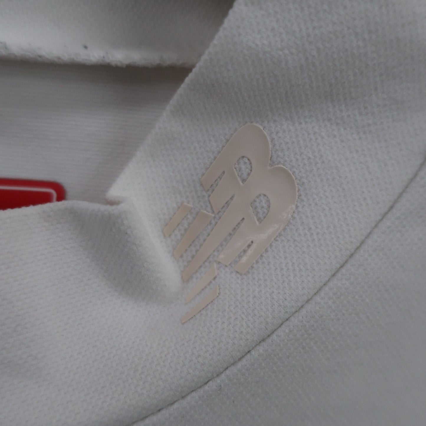 New Balance golf(ニューバランスゴルフ) 半袖モックネックシャツ 白 メンズ 7 012-1166001 A