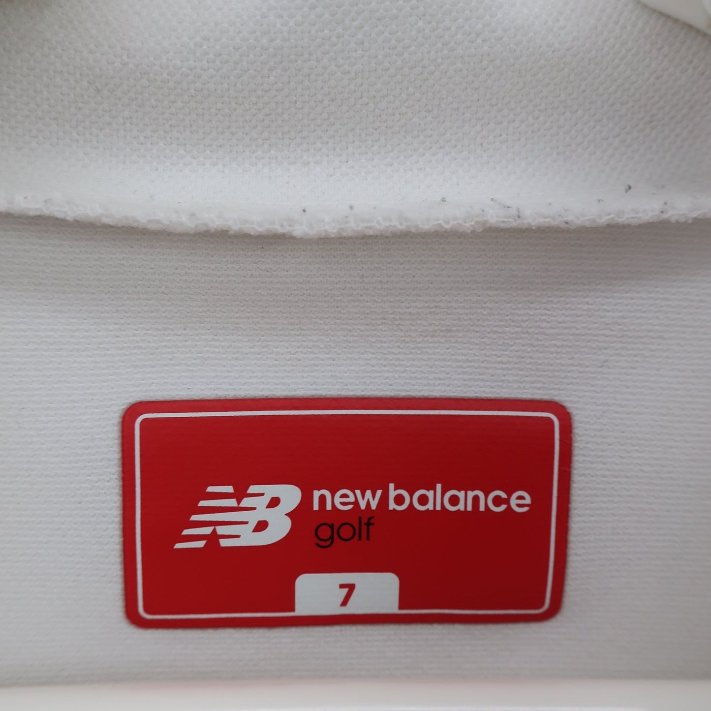 New Balance golf(ニューバランスゴルフ) 半袖モックネックシャツ 白 メンズ 7 012-1166001 A