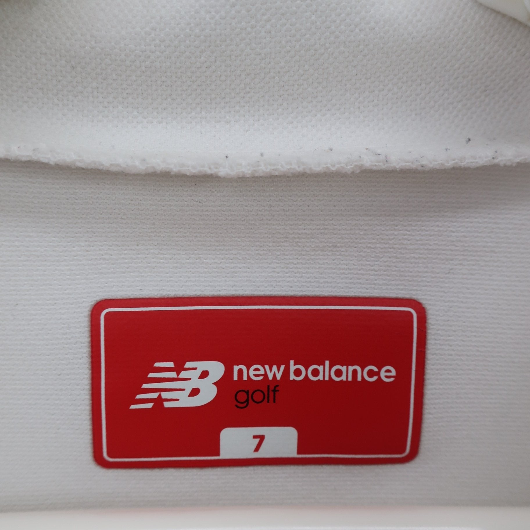 New Balance golf(ニューバランスゴルフ) 半袖モックネックシャツ 白 メンズ 7 012-1166001 A