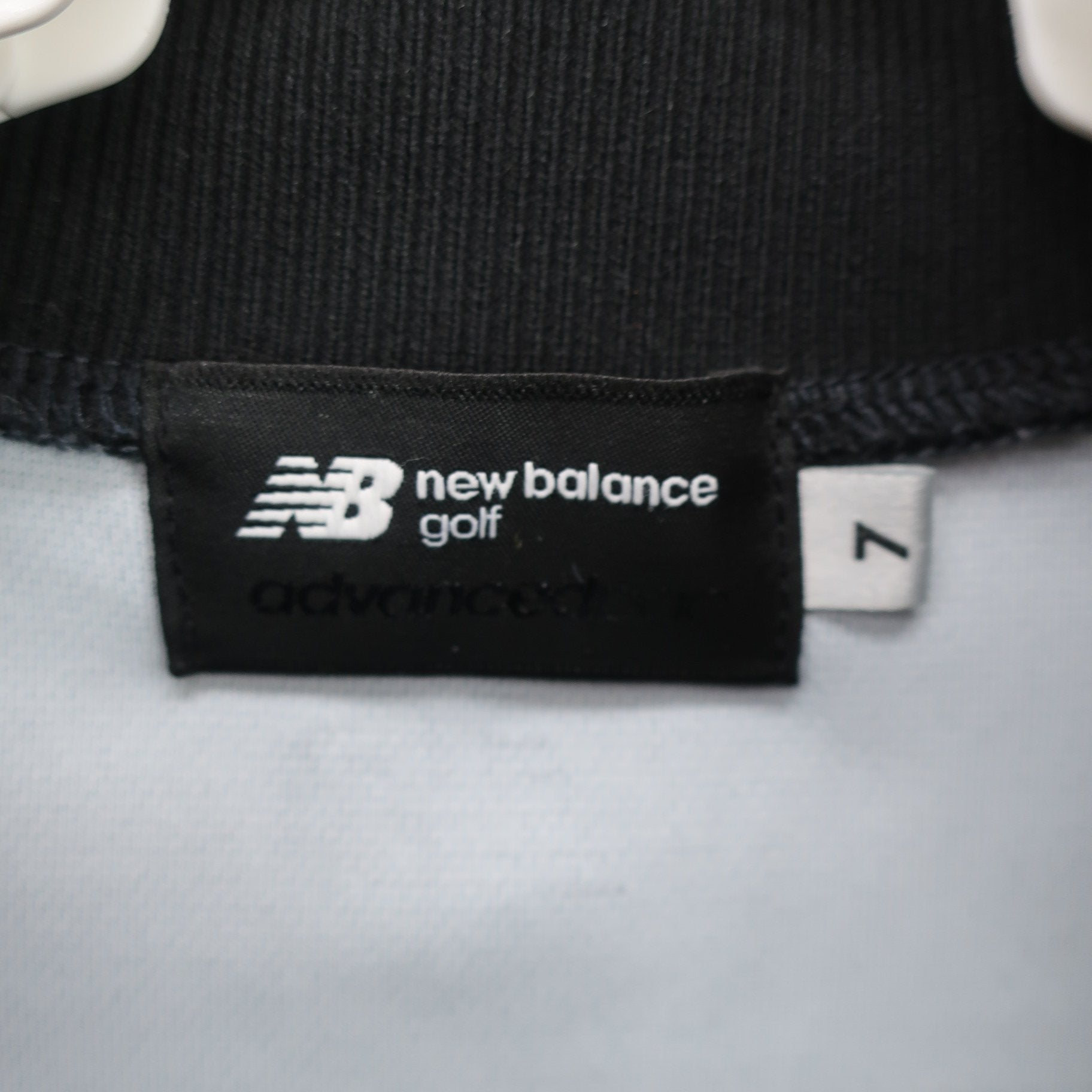 New Balance golf(ニューバランスゴルフ) 半袖モックネックシャツ 黒白ロゴ文字柄 メンズ 7 012-3166103 A