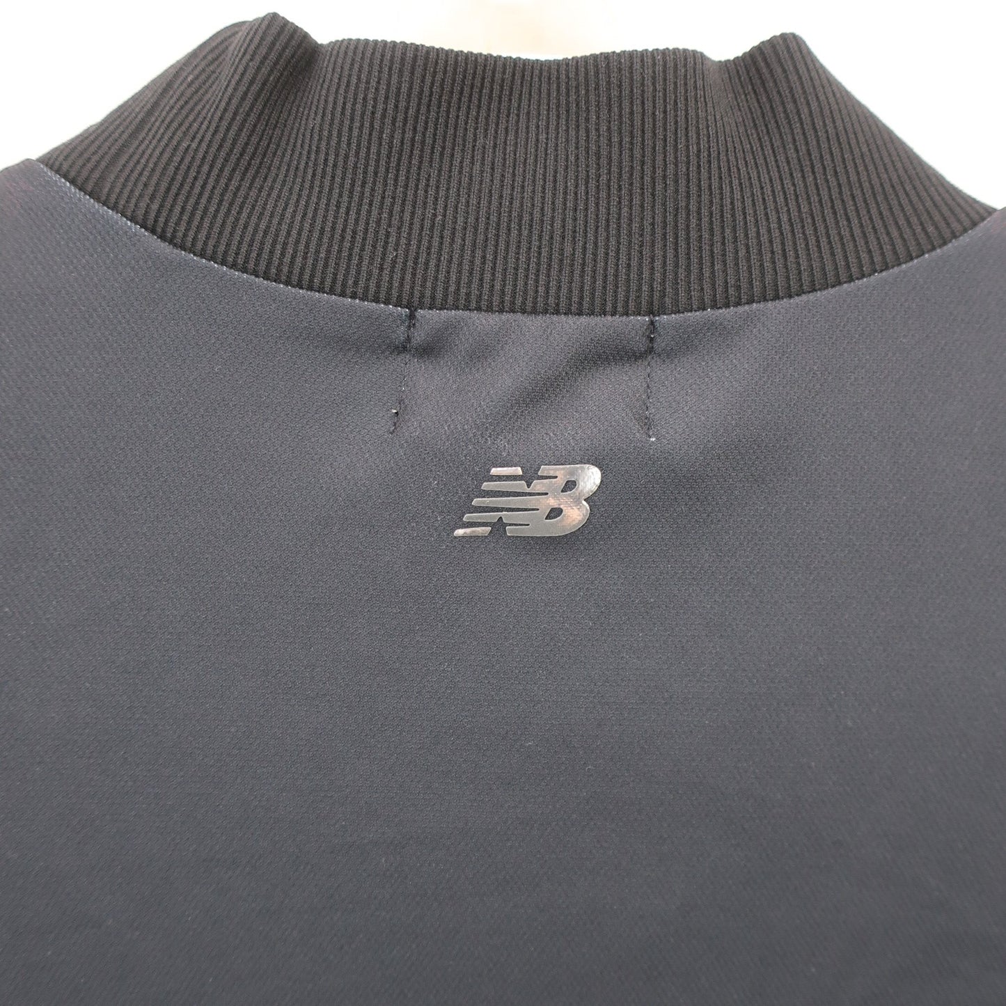 New Balance golf(ニューバランスゴルフ) 半袖モックネックシャツ 黒白ロゴ文字柄 メンズ 7 012-3166103 A