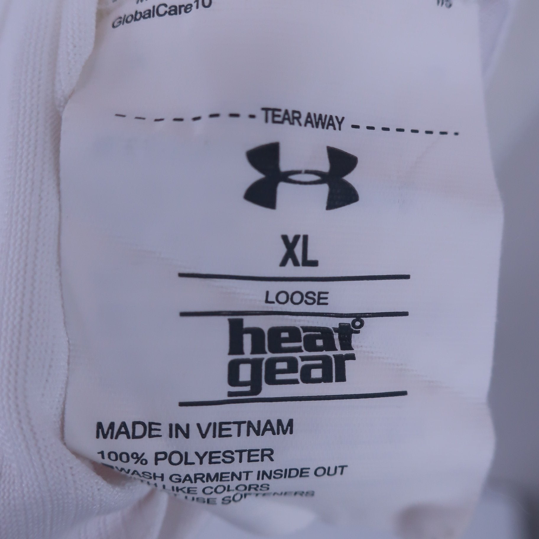 UNDER ARMOUR(アンダーアーマー) ポロシャツ 白 メンズ XL A