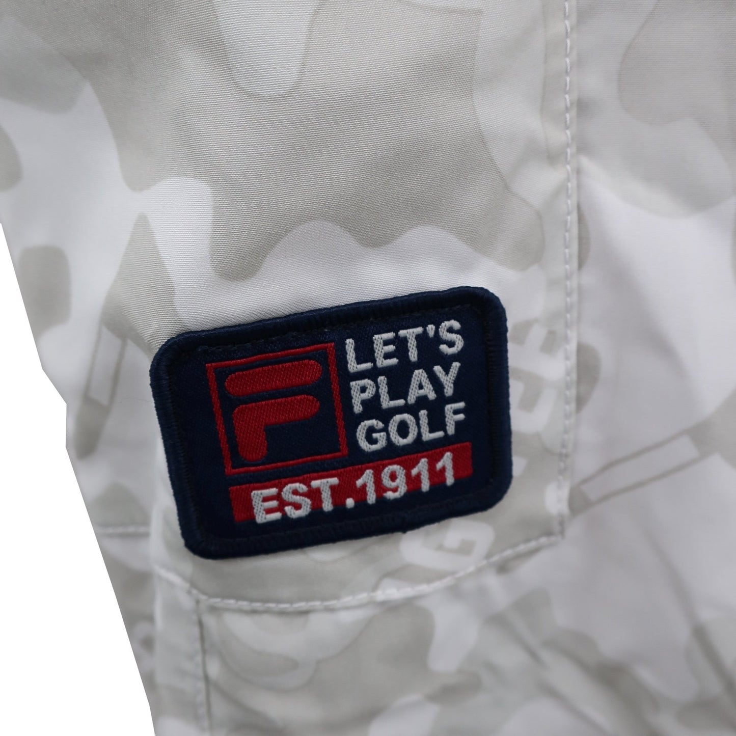 FILA GOLF(フィラゴルフ) ナイロンパンツ 白グレーカモフラ柄 メンズ LL A