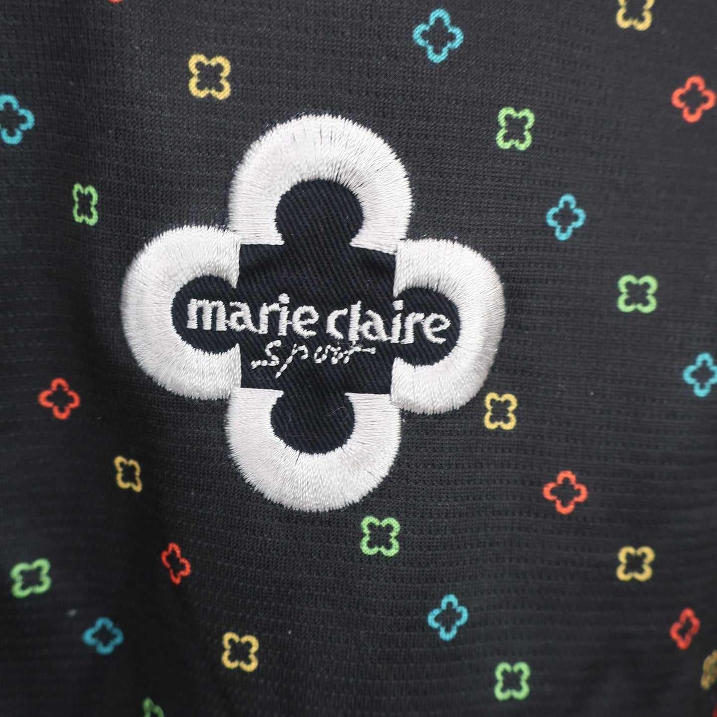 marie claire sport(マリ・クレール・スポーツ) 半袖ハーフジップシャツ 黒 レディース M A