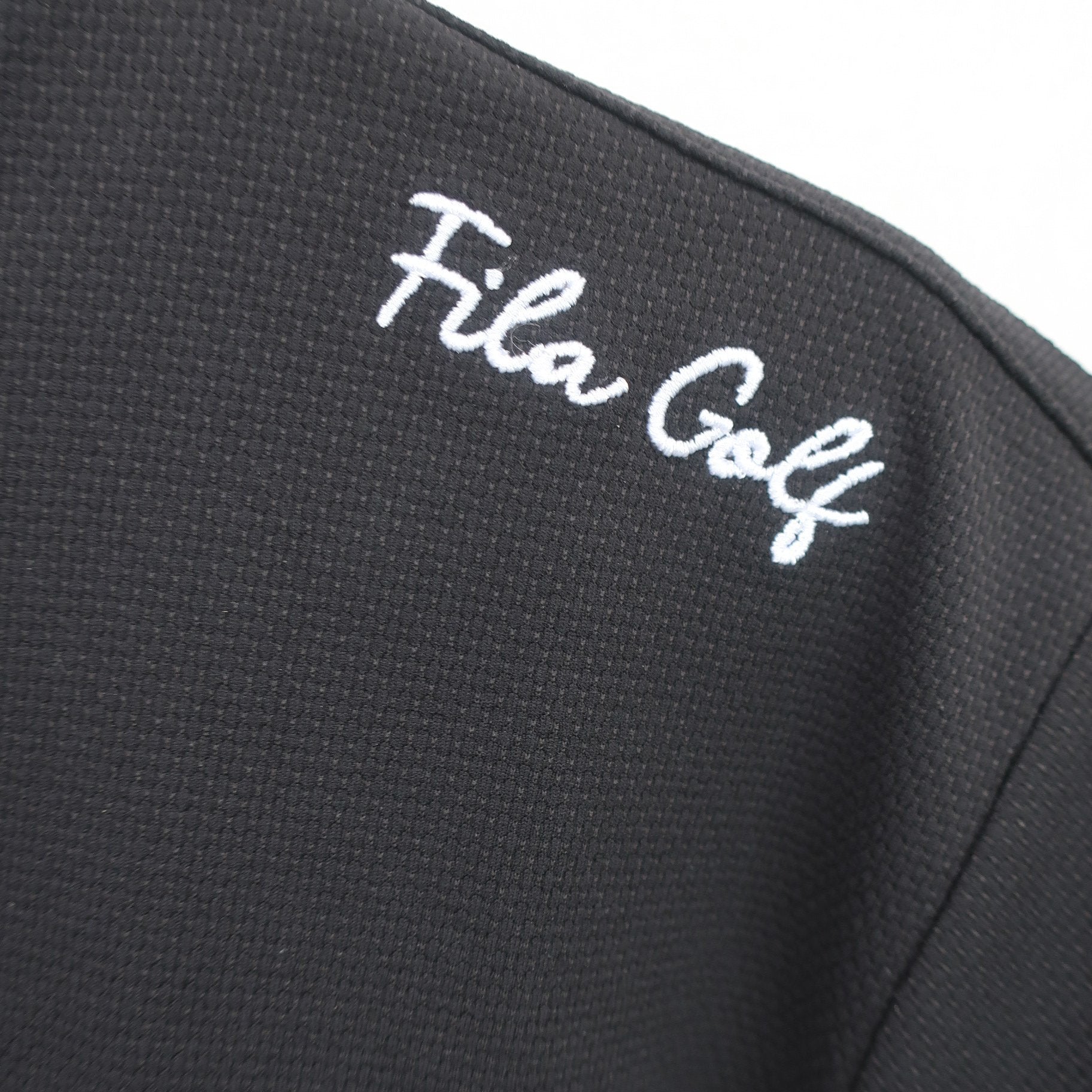 FILA GOLF(フィラゴルフ) 半袖モックネックシャツ 黒白 レディース M N