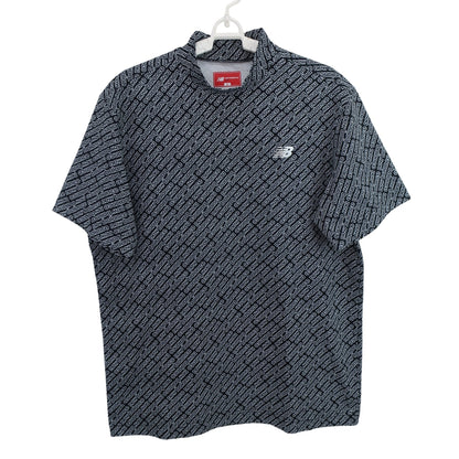 New Balance golf(ニューバランスゴルフ) 半袖モックネックシャツ 黒白ロゴ文字柄 メンズ 6 012-4266002 A