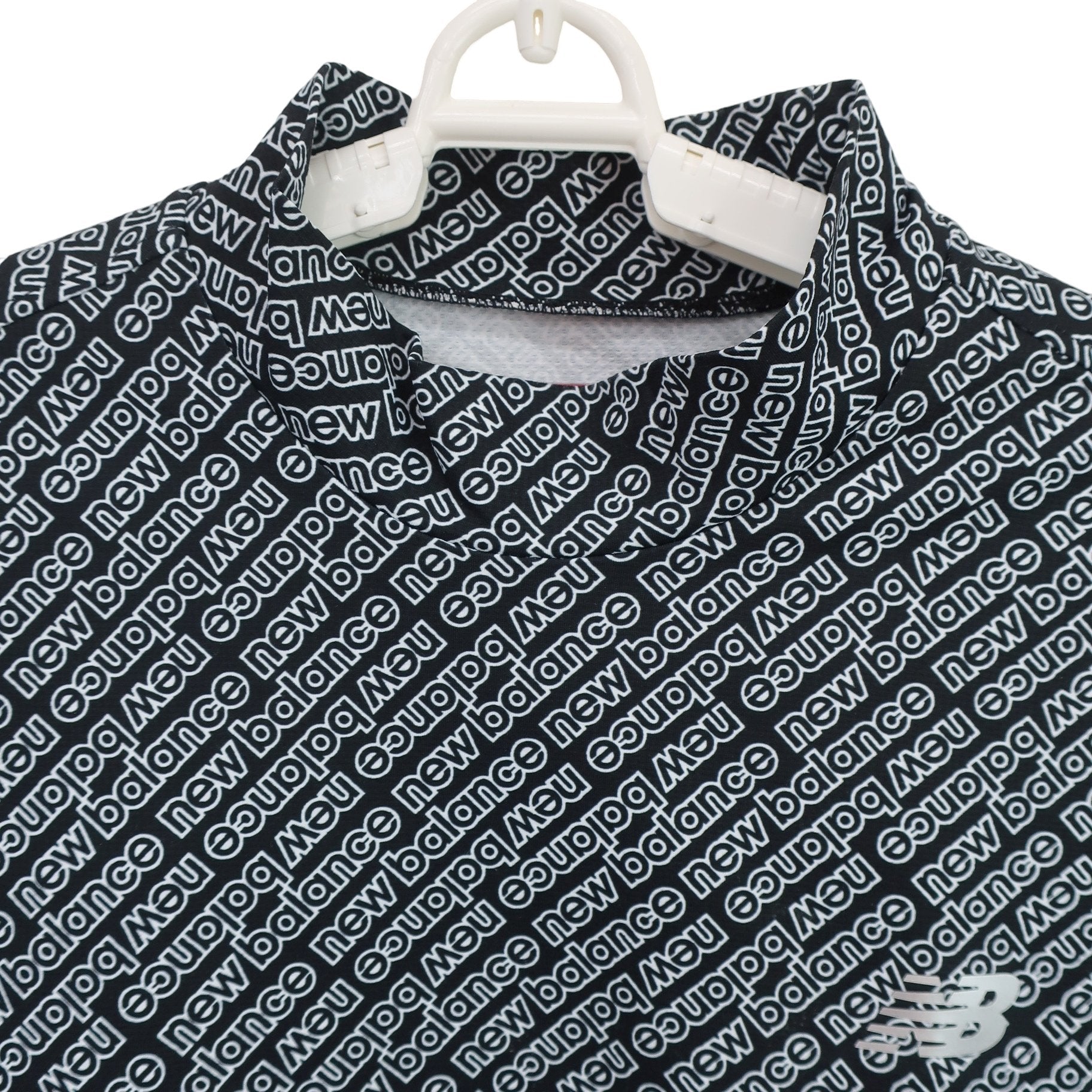 New Balance golf(ニューバランスゴルフ) 半袖モックネックシャツ 黒白ロゴ文字柄 メンズ 6 012-4266002 A