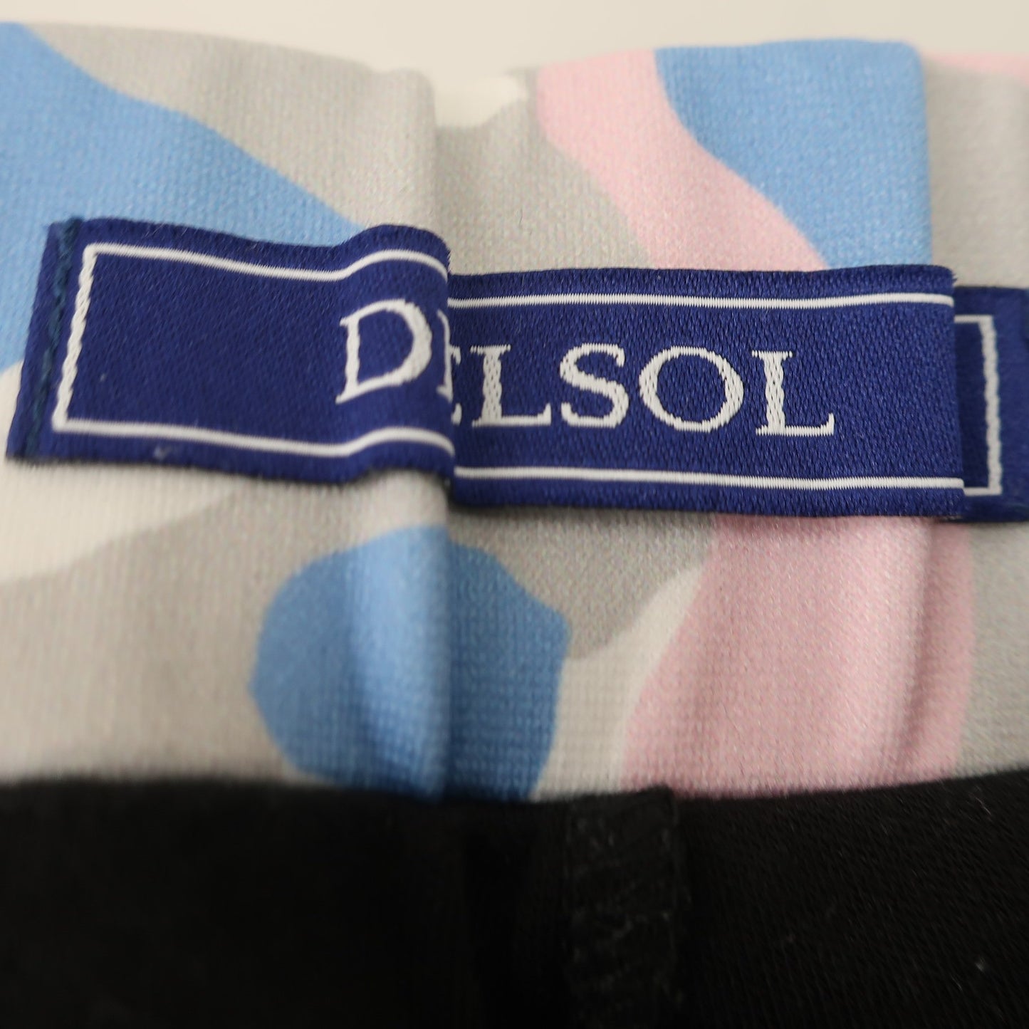 DELSOL(デルソル) パンツ一体型スカート 白カラフルカモフラ柄 レディース M A