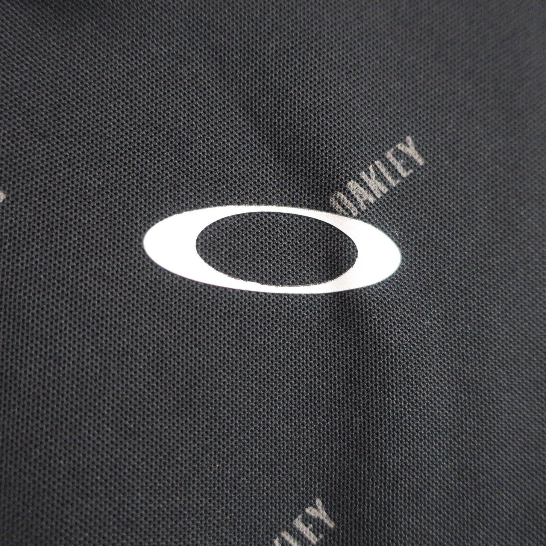OAKLEY(オークリー) ポロシャツ 黒 メンズ L A