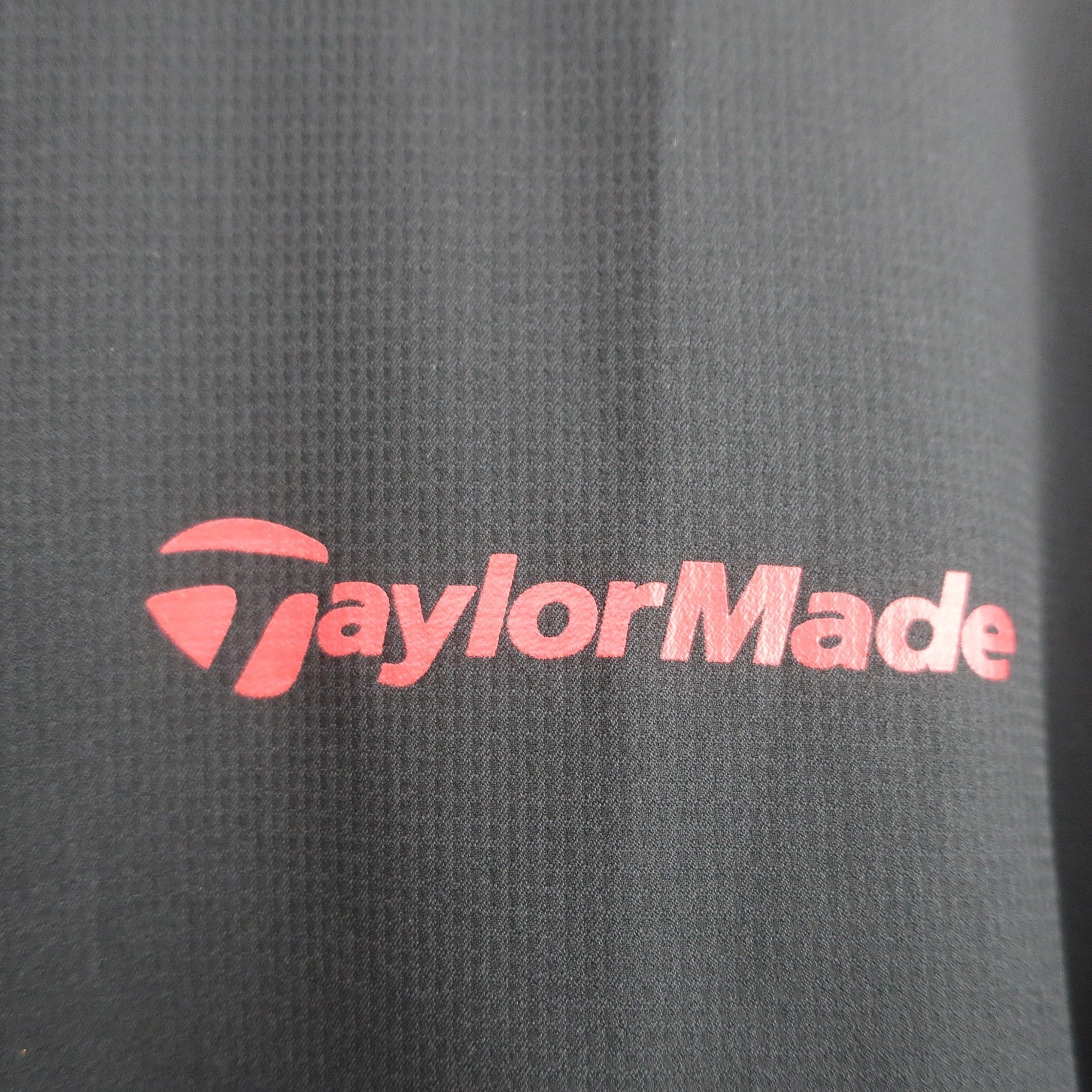 TaylorMade(テーラーメイド) 半袖ハーフジップシャツ 黒赤 メンズ L A