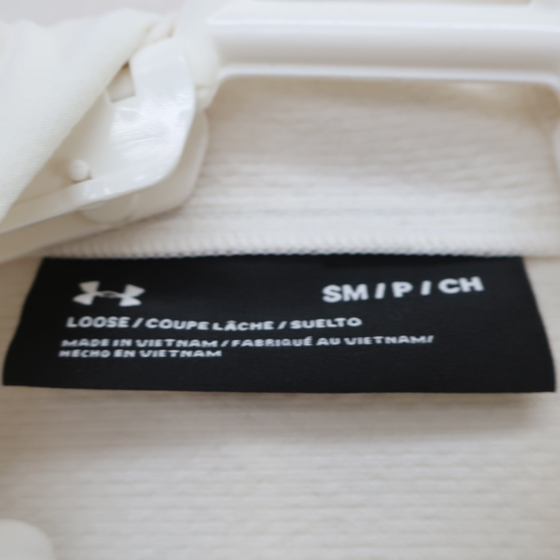 UNDER ARMOUR(アンダーアーマー) パーカー 白 メンズ SM A