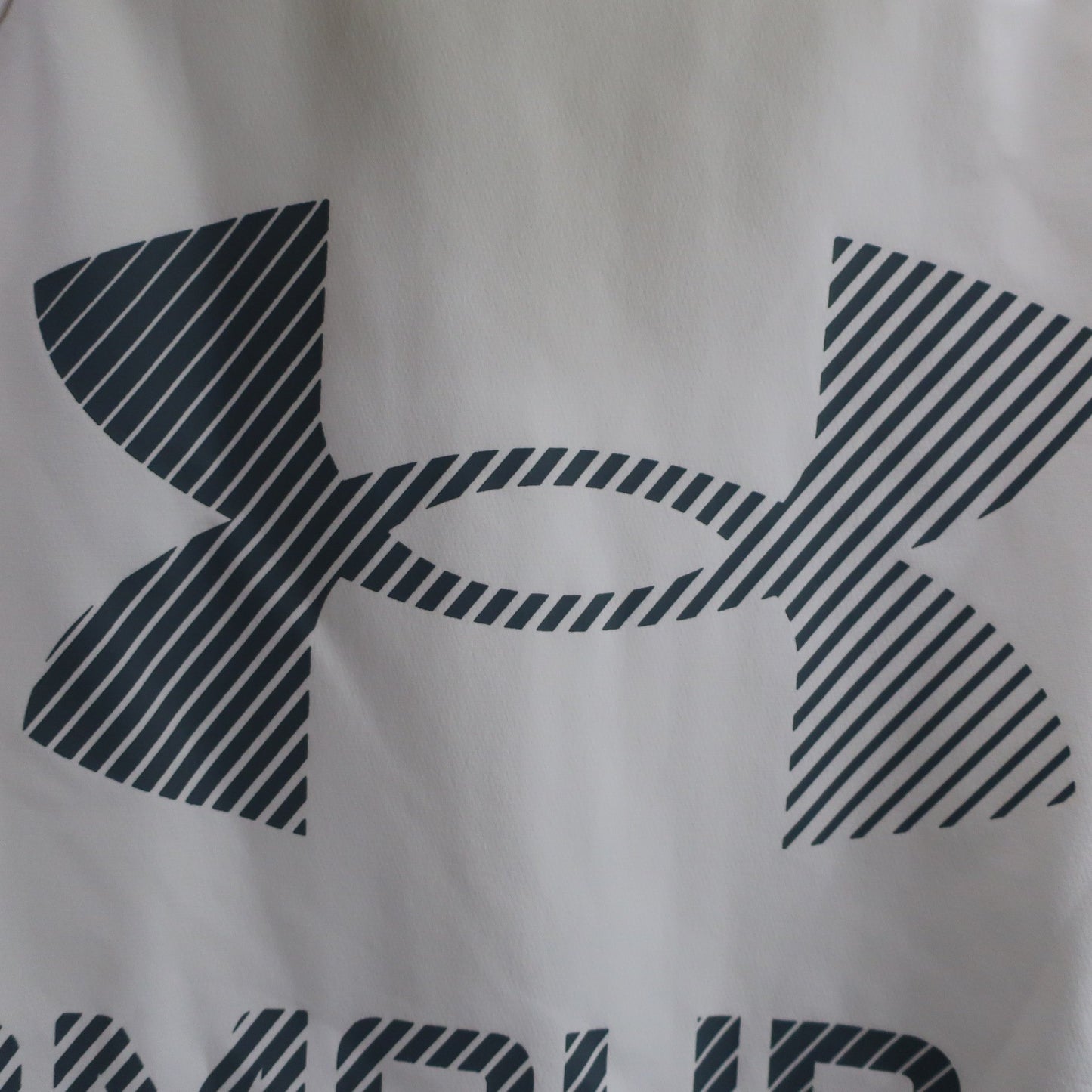 UNDER ARMOUR(アンダーアーマー) パーカー 白 メンズ SM A