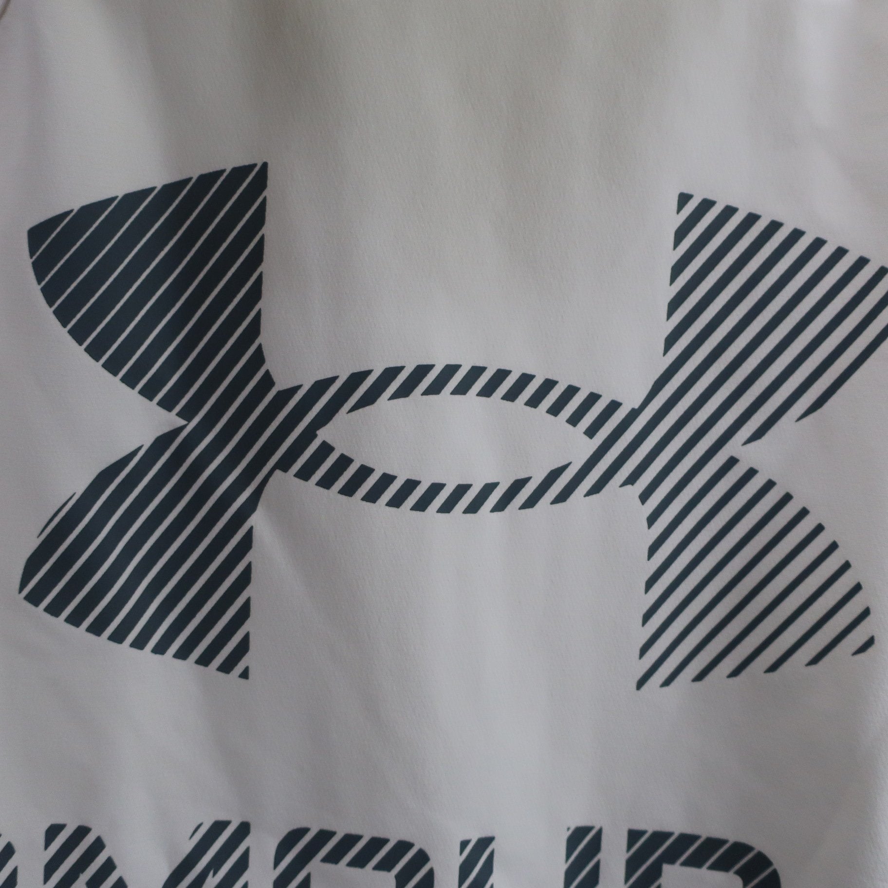 UNDER ARMOUR(アンダーアーマー) パーカー 白 メンズ SM A