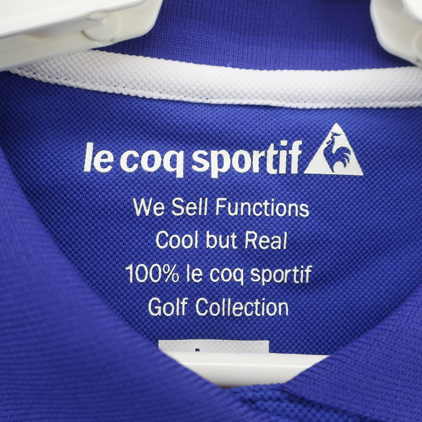 le coq sportif(ルコックスポルティフ) ポロシャツ 青 レディース L N