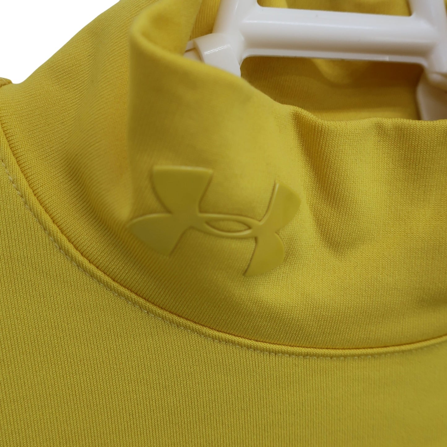 UNDER ARMOUR(アンダーアーマー) ハイネックシャツ 黄色 レディース SM A