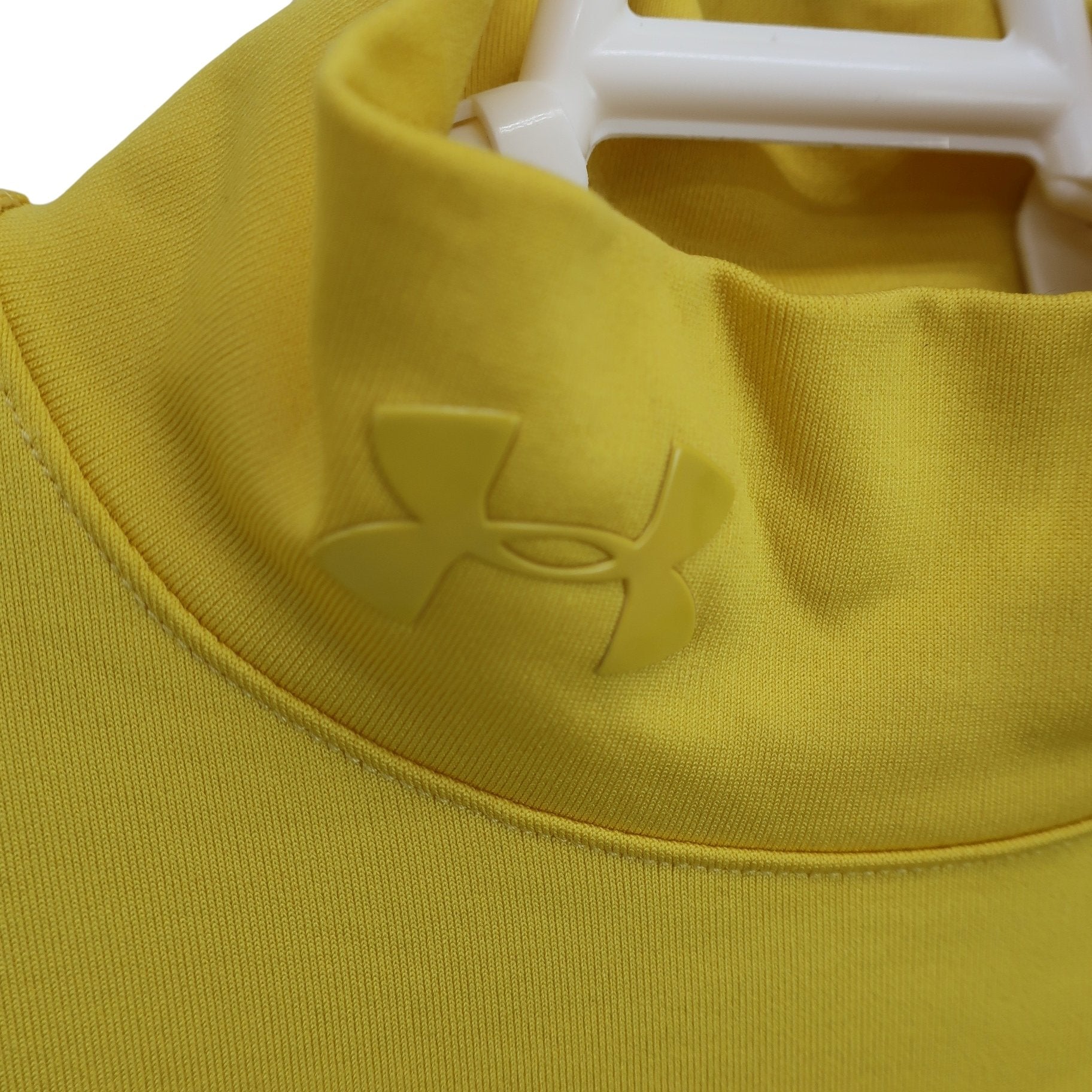 UNDER ARMOUR(アンダーアーマー) ハイネックシャツ 黄色 レディース SM A