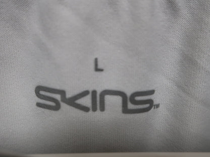SKINS(スキンズ) ハーフジップインナーセットシャツ ネイビー / 白 メンズ L 184-21310-098 N