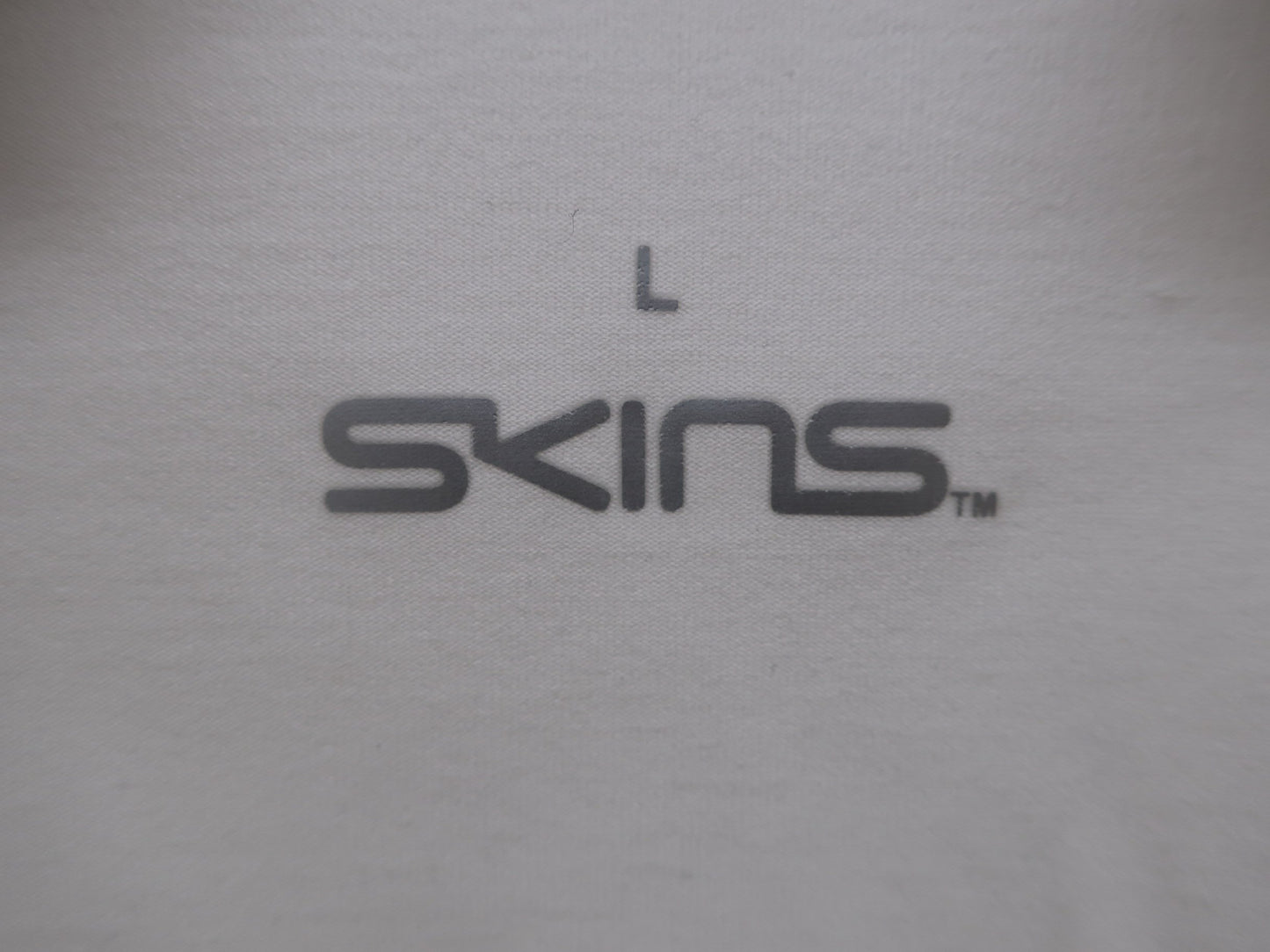 SKINS(スキンズ) ポロシャツ 黒白 メンズ L N