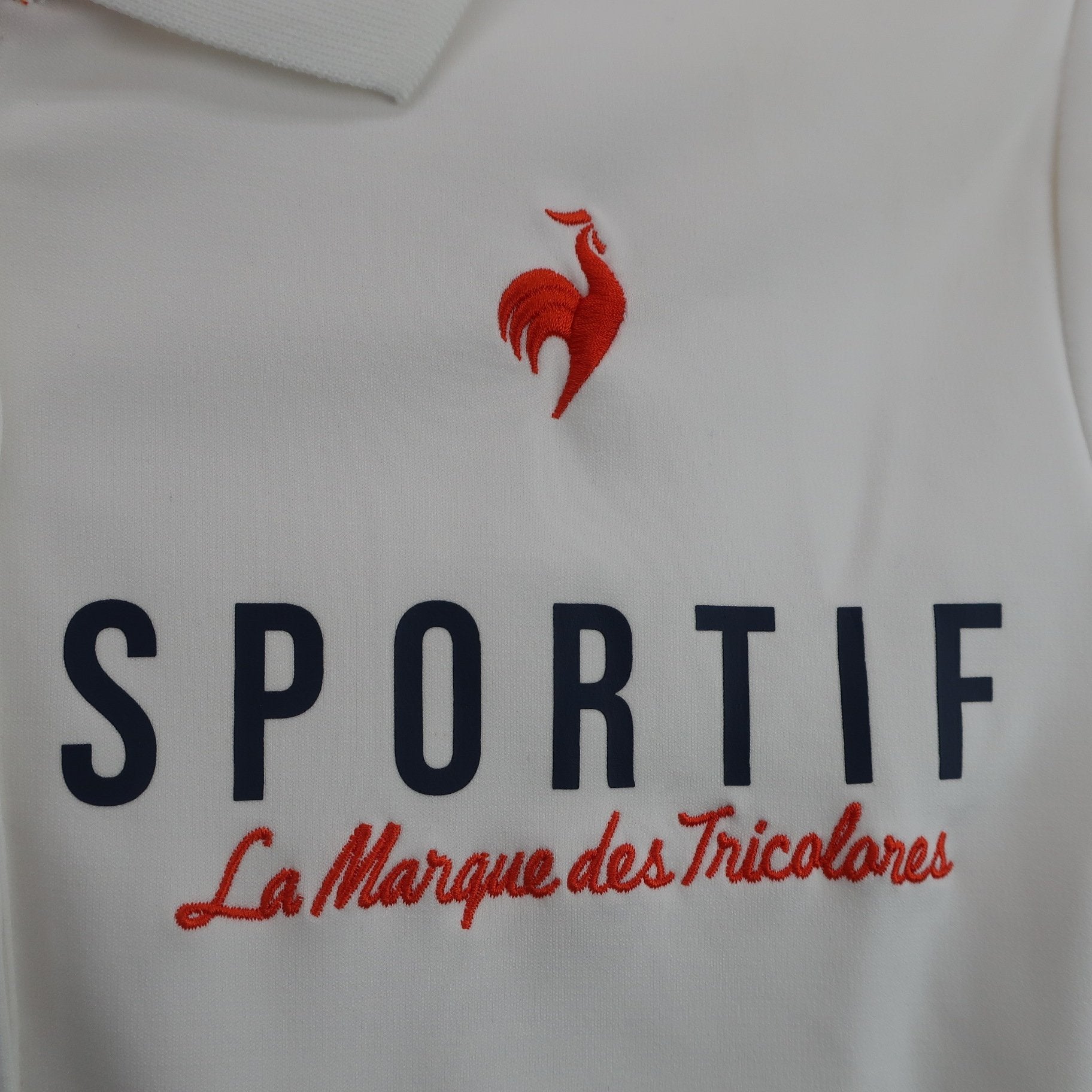 le coq sportif(ルコックスポルティフ) ポロシャツ 白 レディース M A