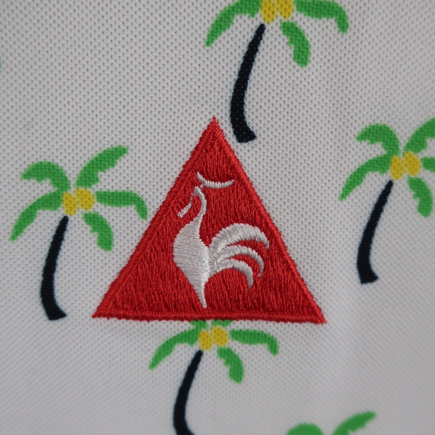 le coq sportif(ルコックスポルティフ) ポロシャツ 白ヤシの木柄 レディース M A