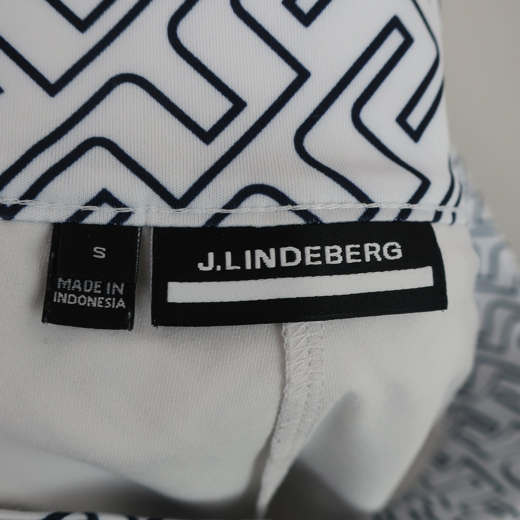 J.LINDEBERG(ジェイ リンドバーグ) スカート 白ネイビー総柄 レディース S B