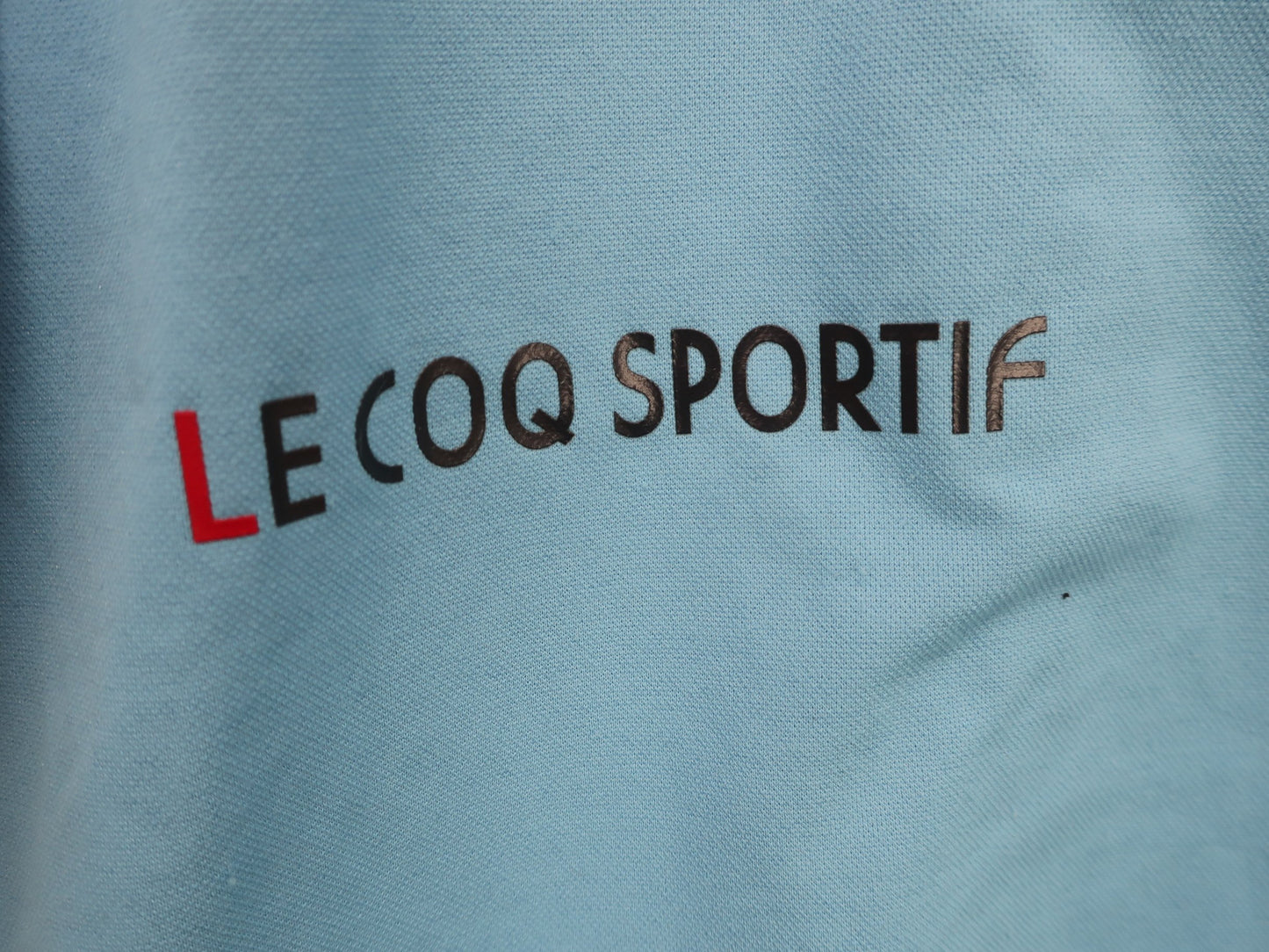 le coq sportif(ルコックスポルティフ) ハーフジップシャツ 水色 メンズ LL B