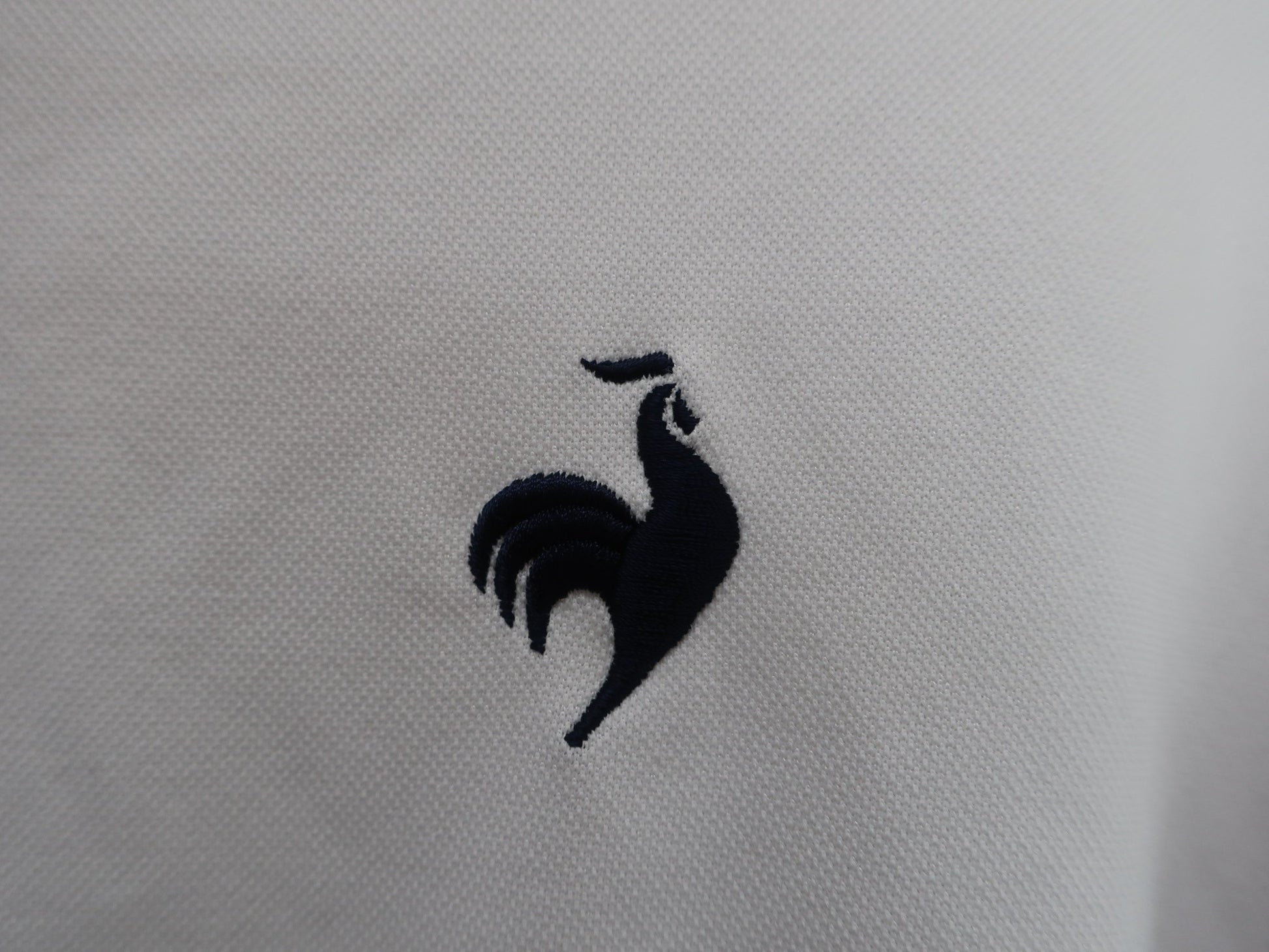 le coq sportif(ルコックスポルティフ) ハーフジップシャツ 白黒 メンズ LL A
