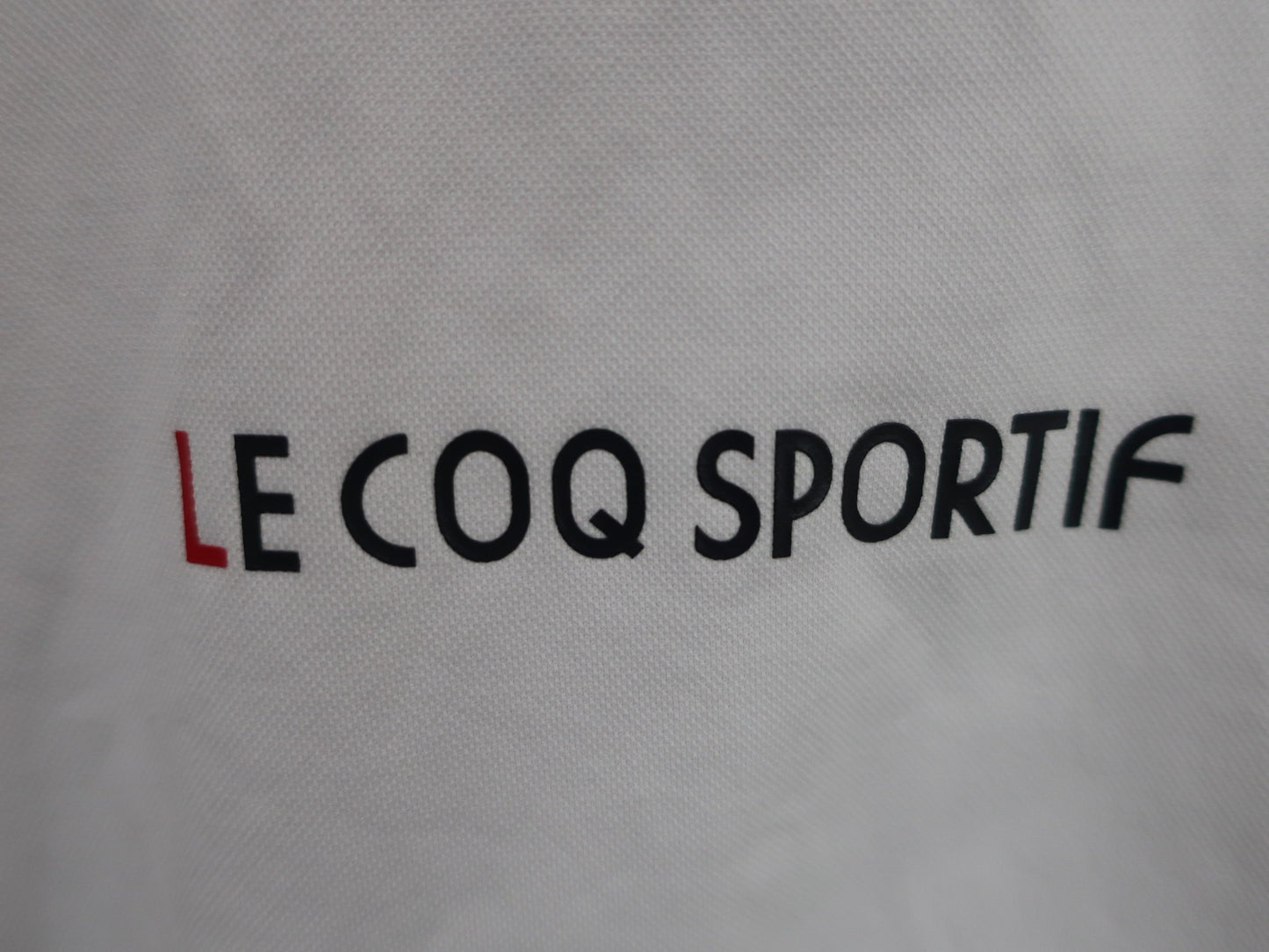 le coq sportif(ルコックスポルティフ) ハーフジップシャツ 白黒 メンズ LL A