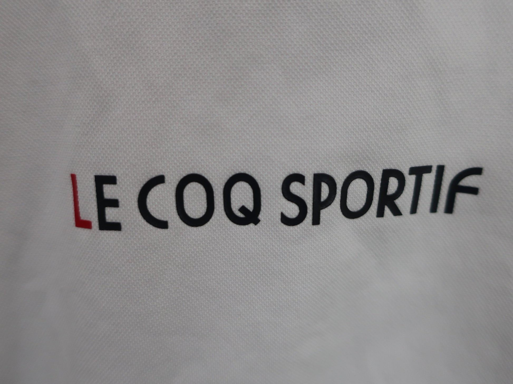 le coq sportif(ルコックスポルティフ) ハーフジップシャツ 白黒 メンズ LL A