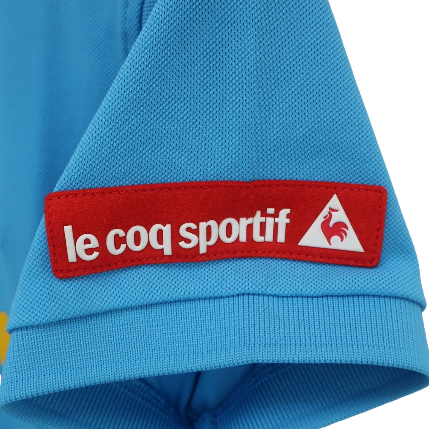 le coq sportif(ルコックスポルティフ) ポロシャツ 水色 レディース M A