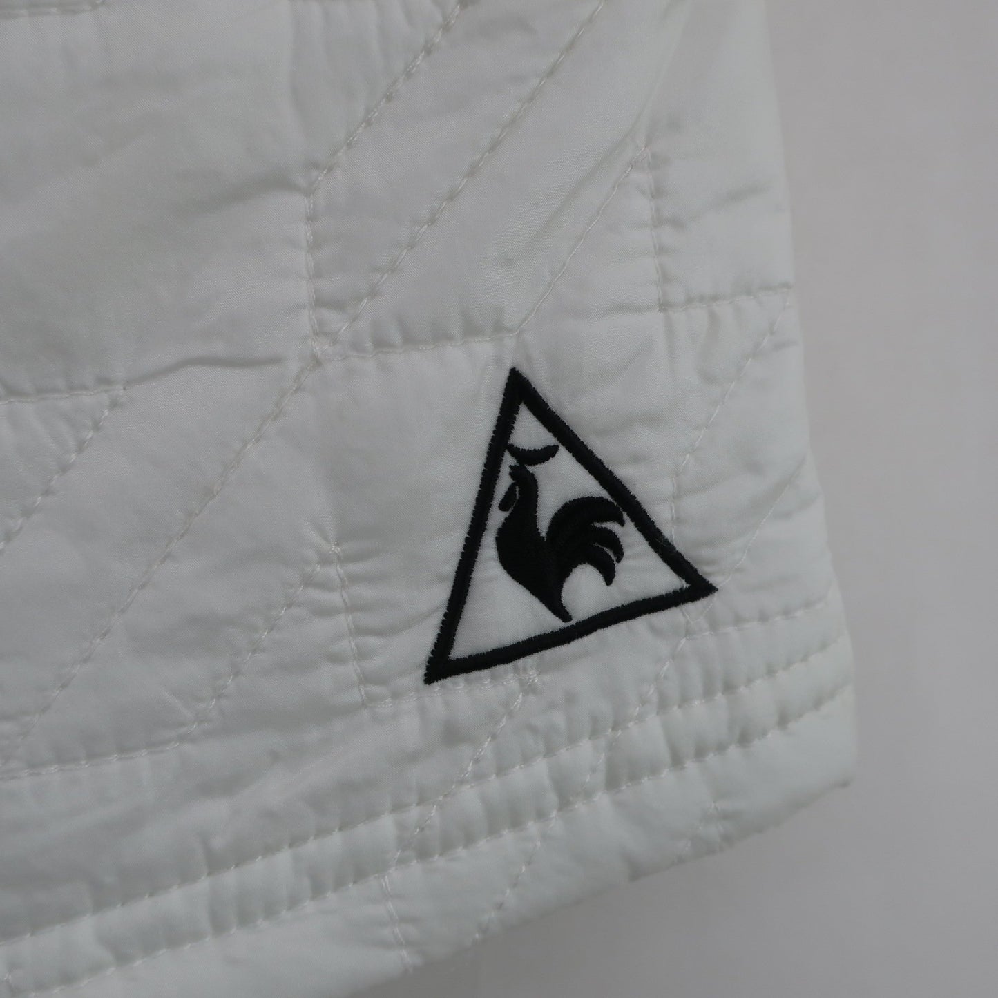 le coq sportif(ルコックスポルティフ) ナイロンスカート 白 レディース 9 A