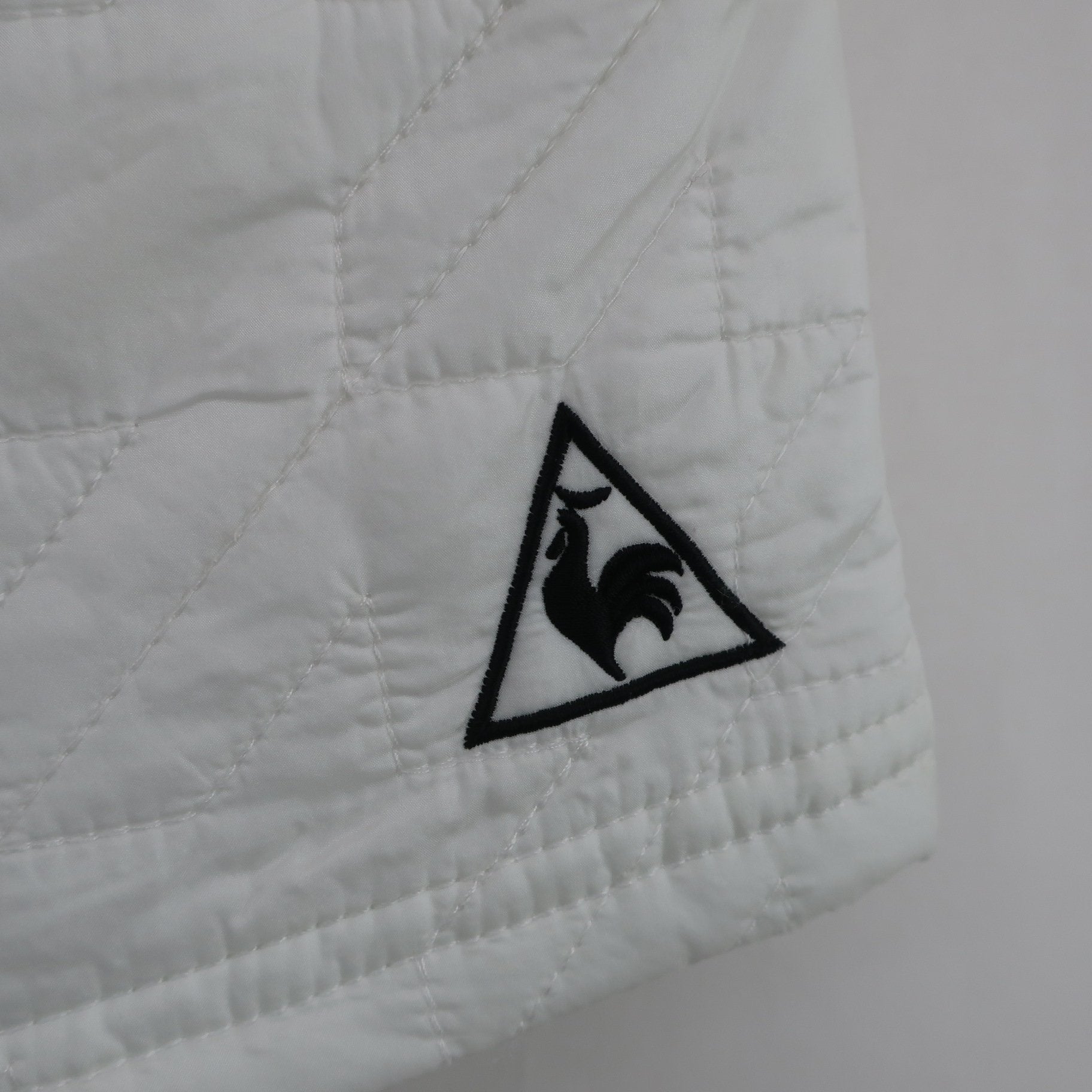 le coq sportif(ルコックスポルティフ) ナイロンスカート 白 レディース 9 A