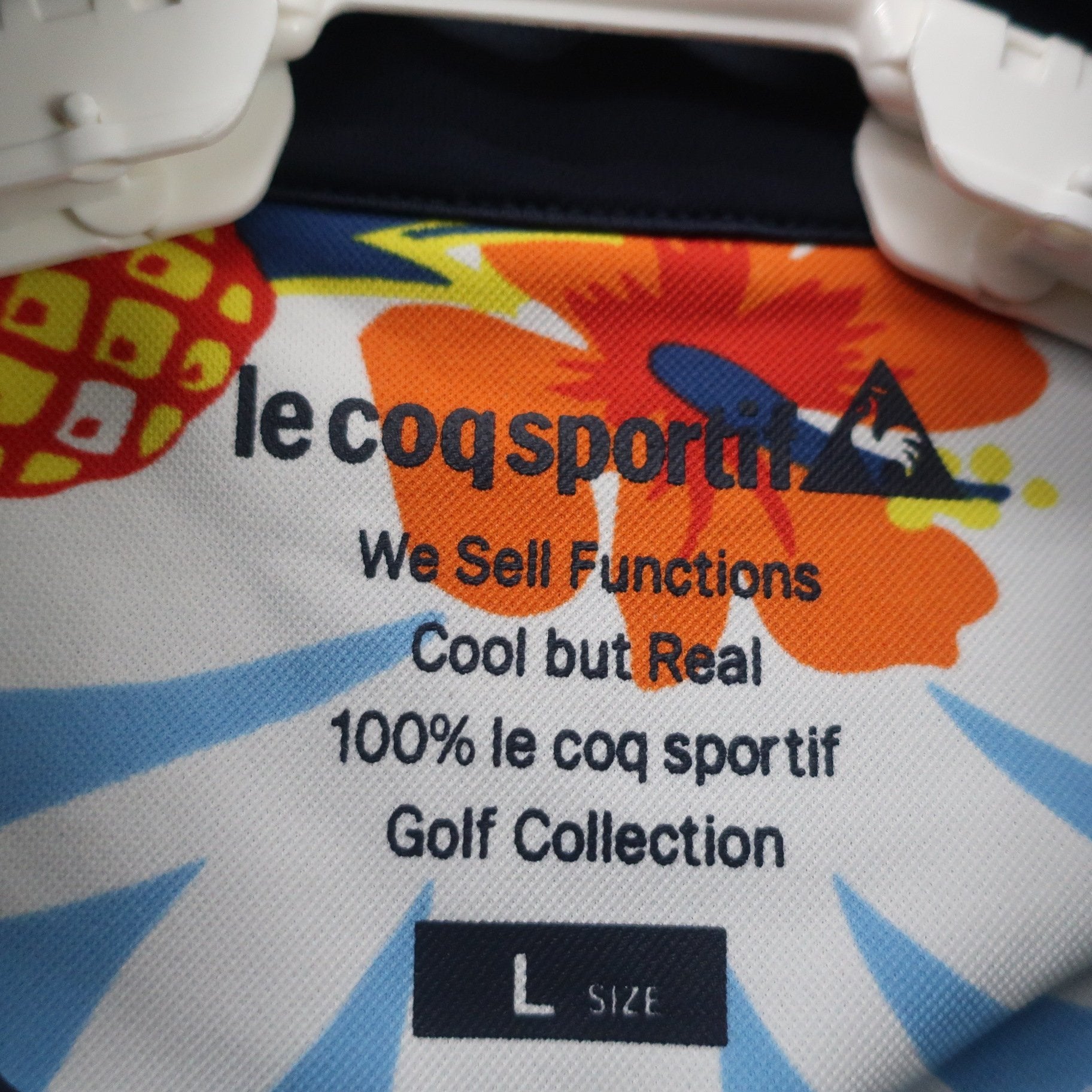 le coq sportif(ルコックスポルティフ) 半袖ハーフジップシャツ ネイビー レディース L A
