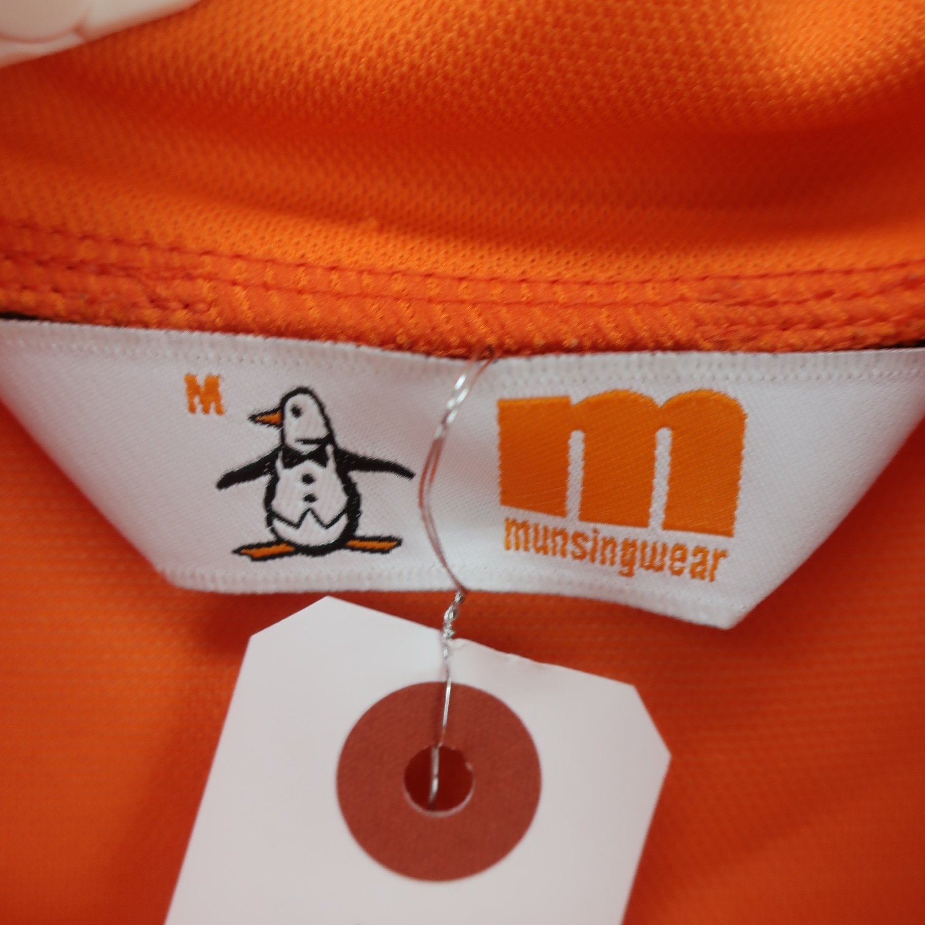 Munsingwear(マンシングウェア) 半袖モックネックシャツ オレンジ白 レディース M B
