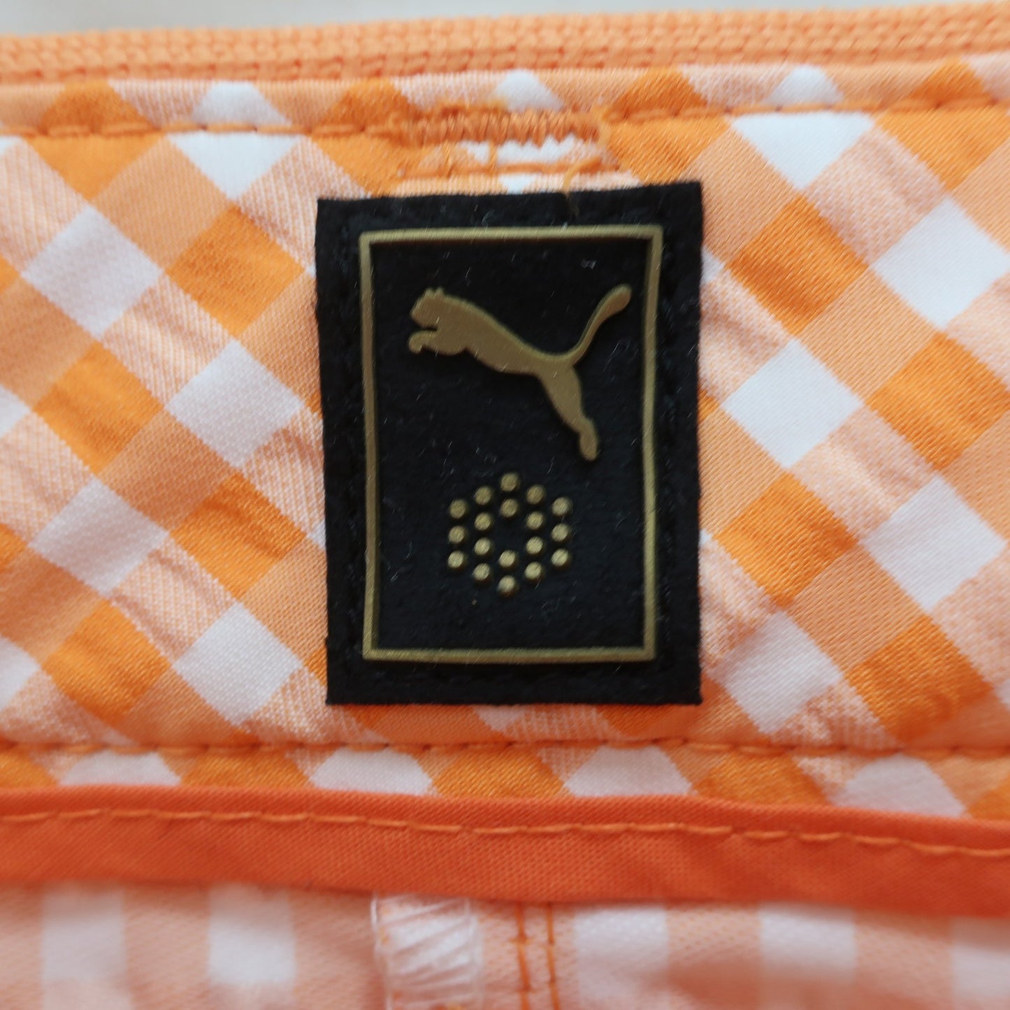 PUMA GOLF(プーマゴルフ) スカート オレンジチェック レディース 64 A