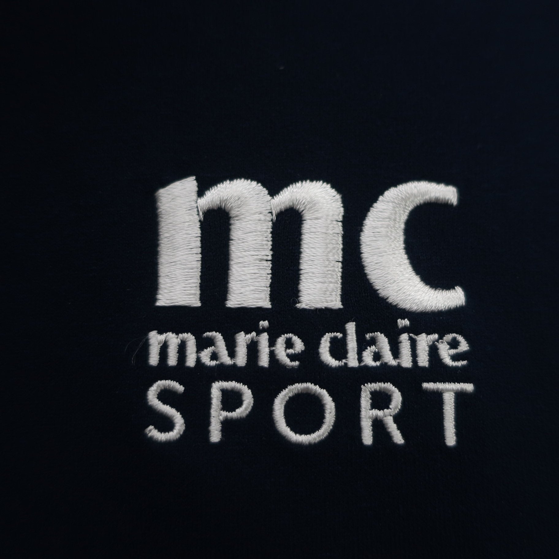 marie claire sport(マリ・クレール・スポーツ) 長袖モックネックシャツ ネイビー レディース S A