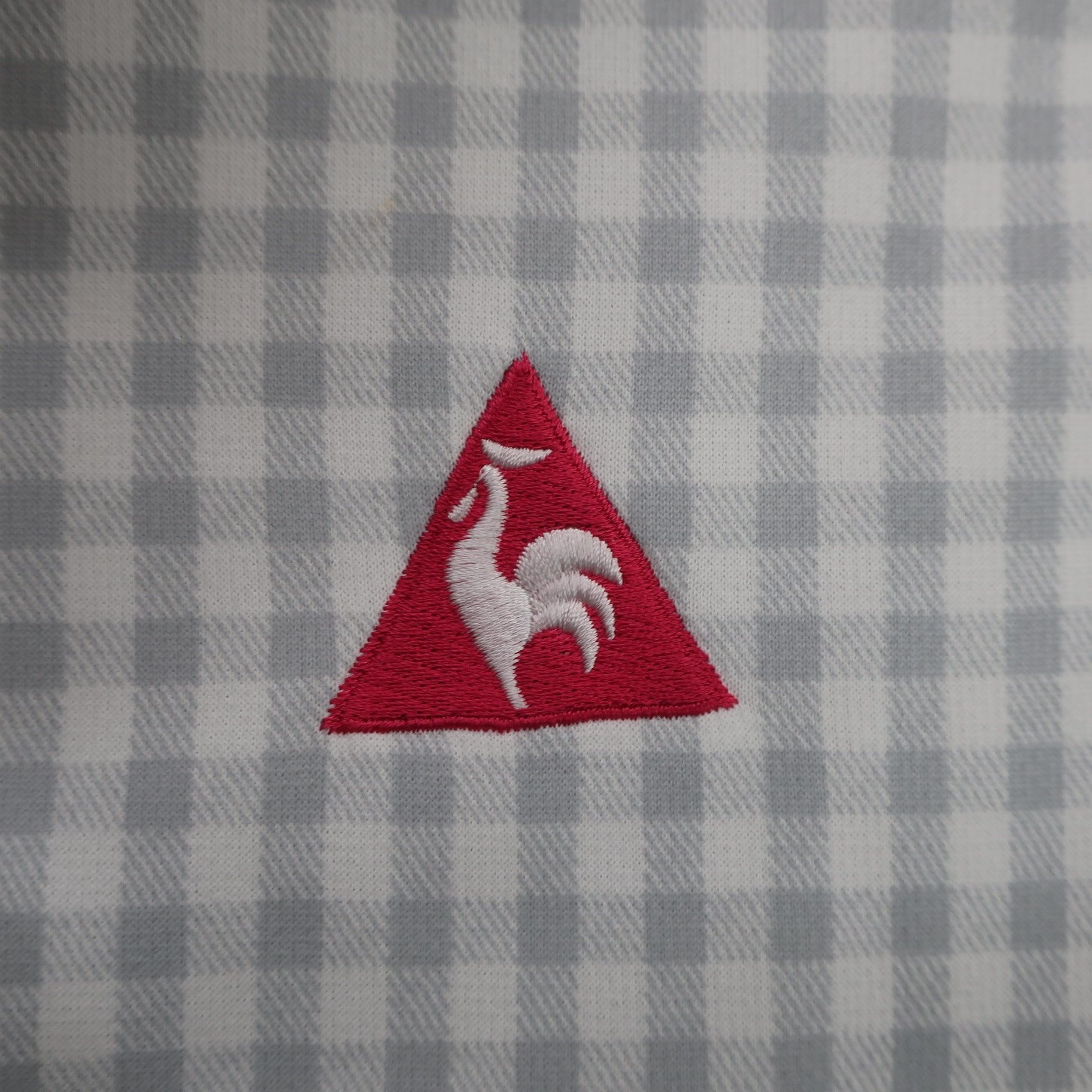le coq sportif(ルコックスポルティフ) ポロシャツ 白グレーチェック レディース S A