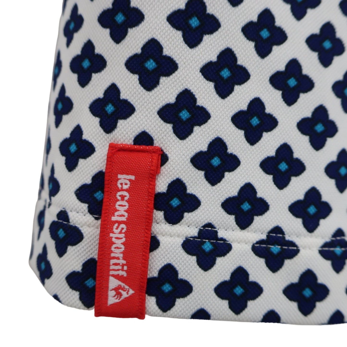 le coq sportif(ルコックスポルティフ) ポロシャツ 白ネイビー総柄 レディース L A