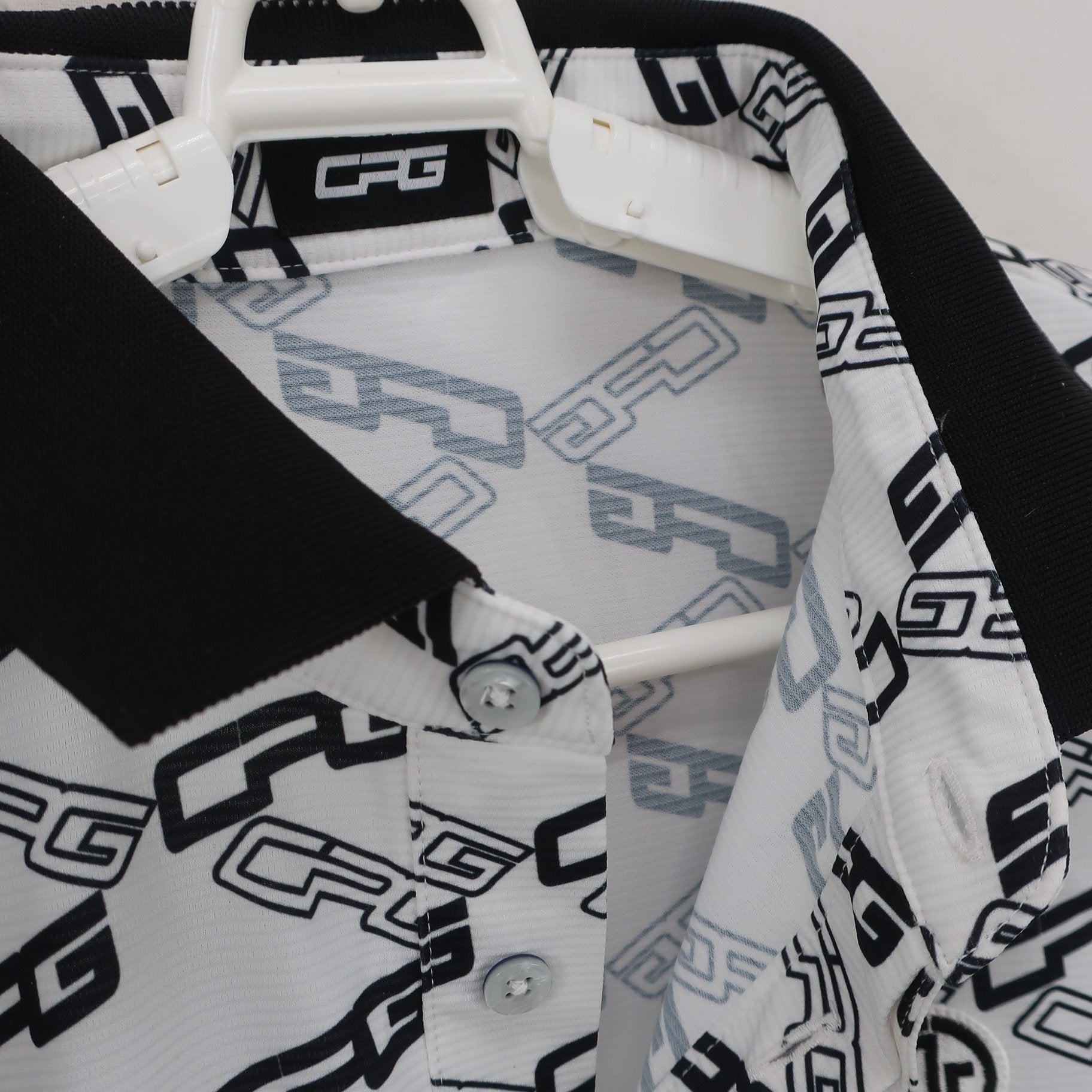 CPG GOLF(シーピージーゴルフ) ポロシャツ 白黒ロゴ総柄 メンズ 3 2109-22109 B