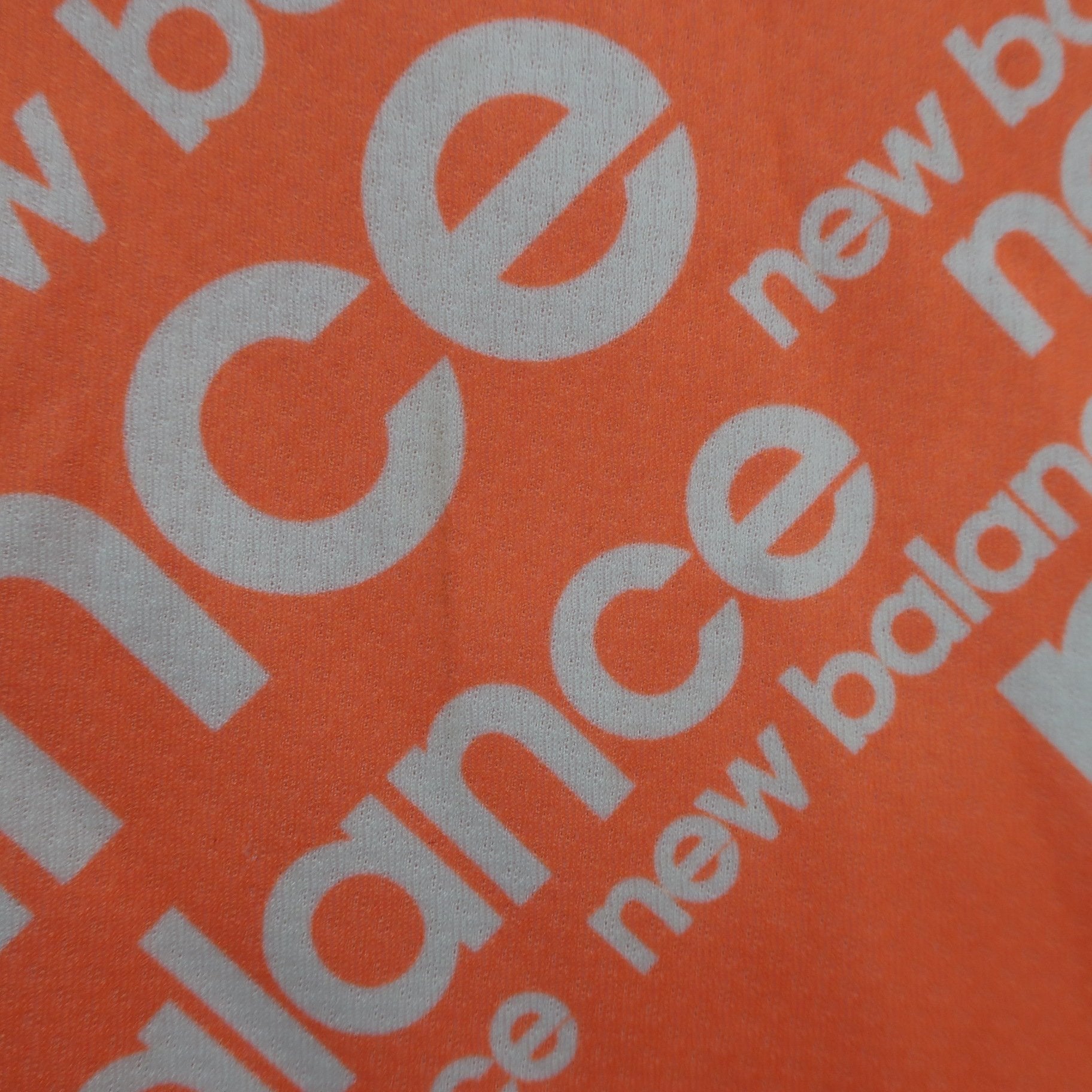 New Balance golf(ニューバランスゴルフ) ポロシャツ オレンジ白ロゴ柄 レディース 1 012-3268601 A