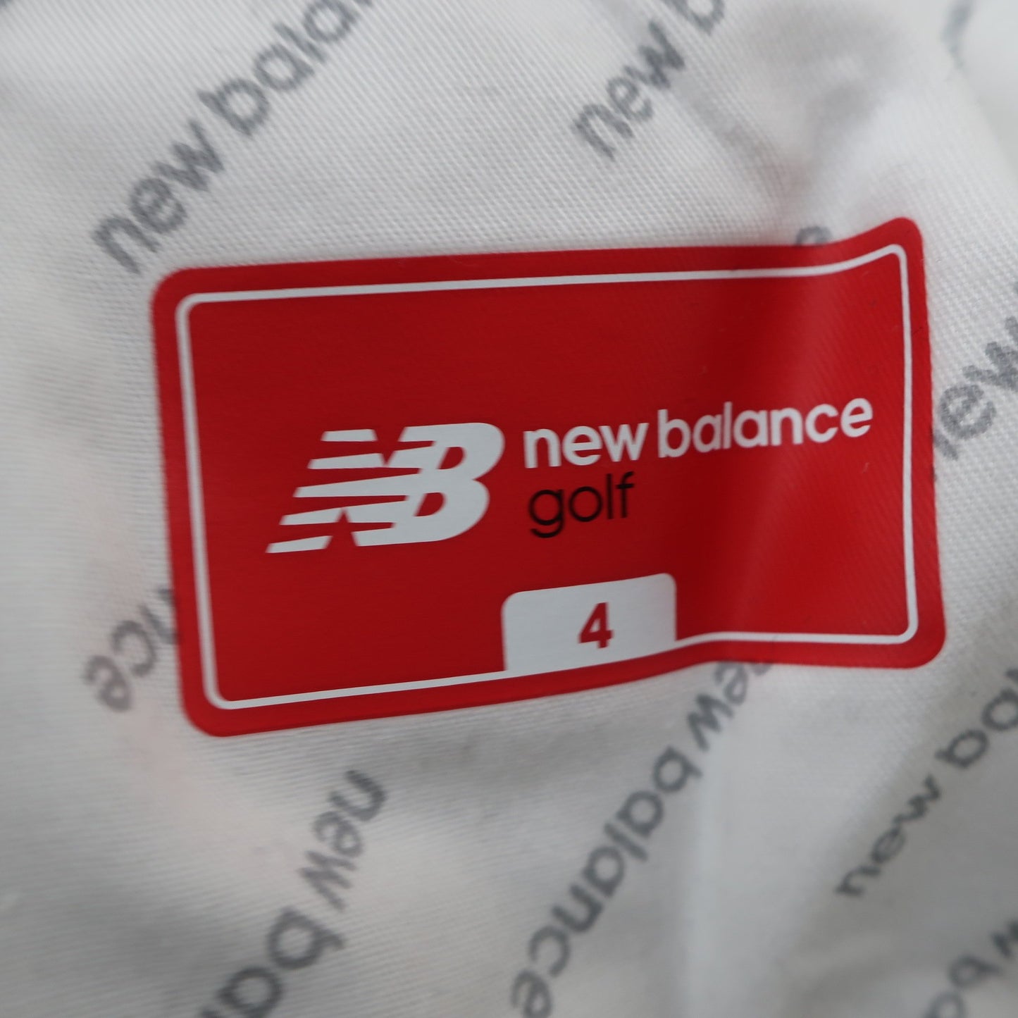New Balance golf(ニューバランスゴルフ) ナイロンパンツ 白グレーロゴ柄 メンズ 4 012-9231003 A