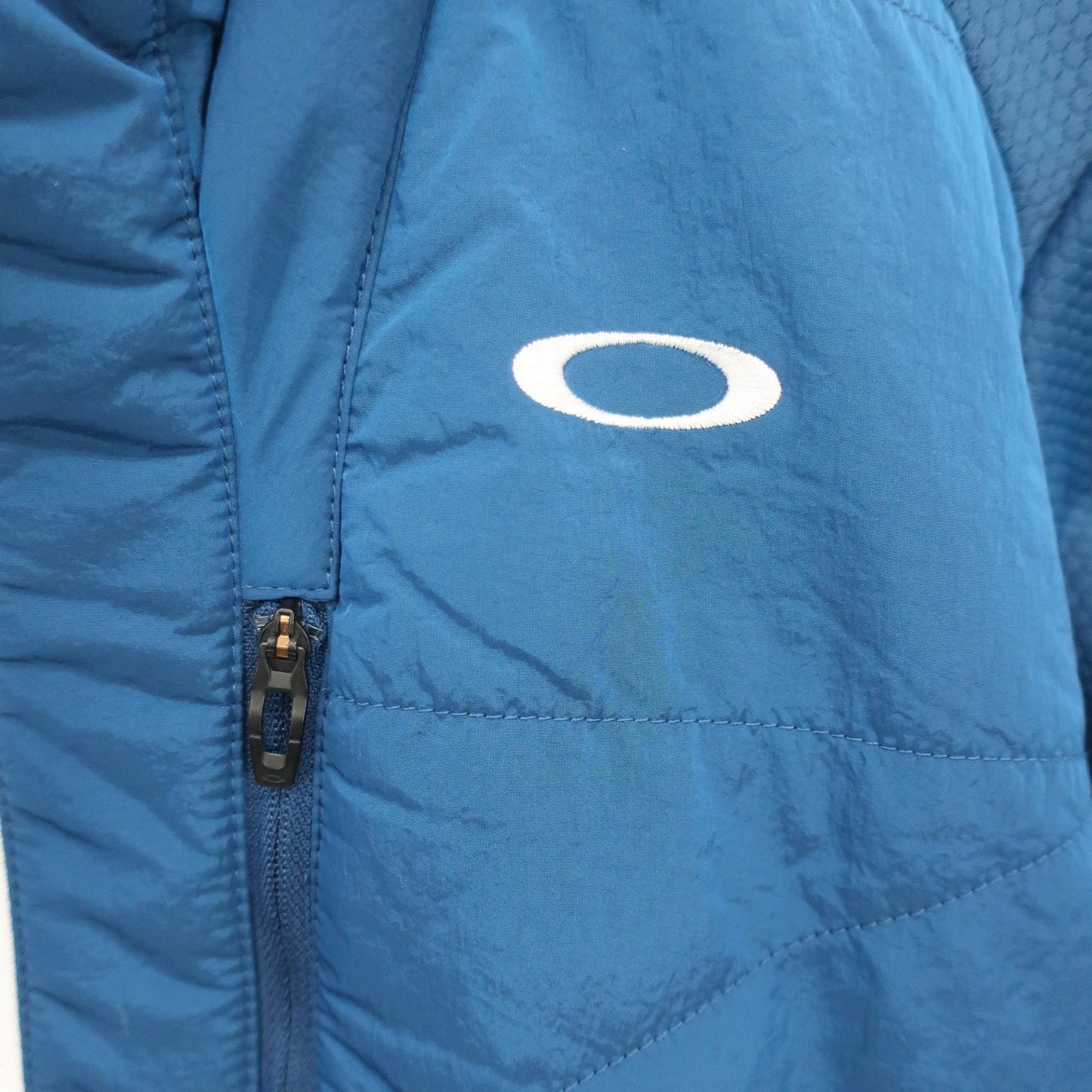 OAKLEY(オークリー) フルジップジャケット 青 メンズ M A
