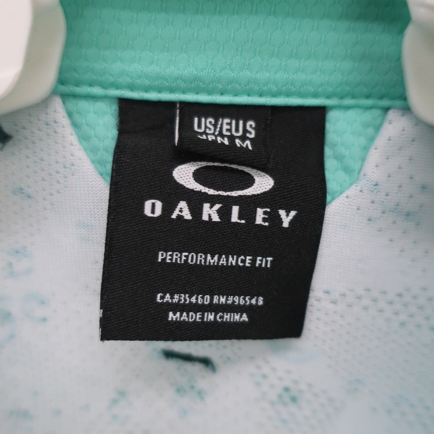 OAKLEY(オークリー) ハーフジップポロシャツ 緑総柄 メンズ M A