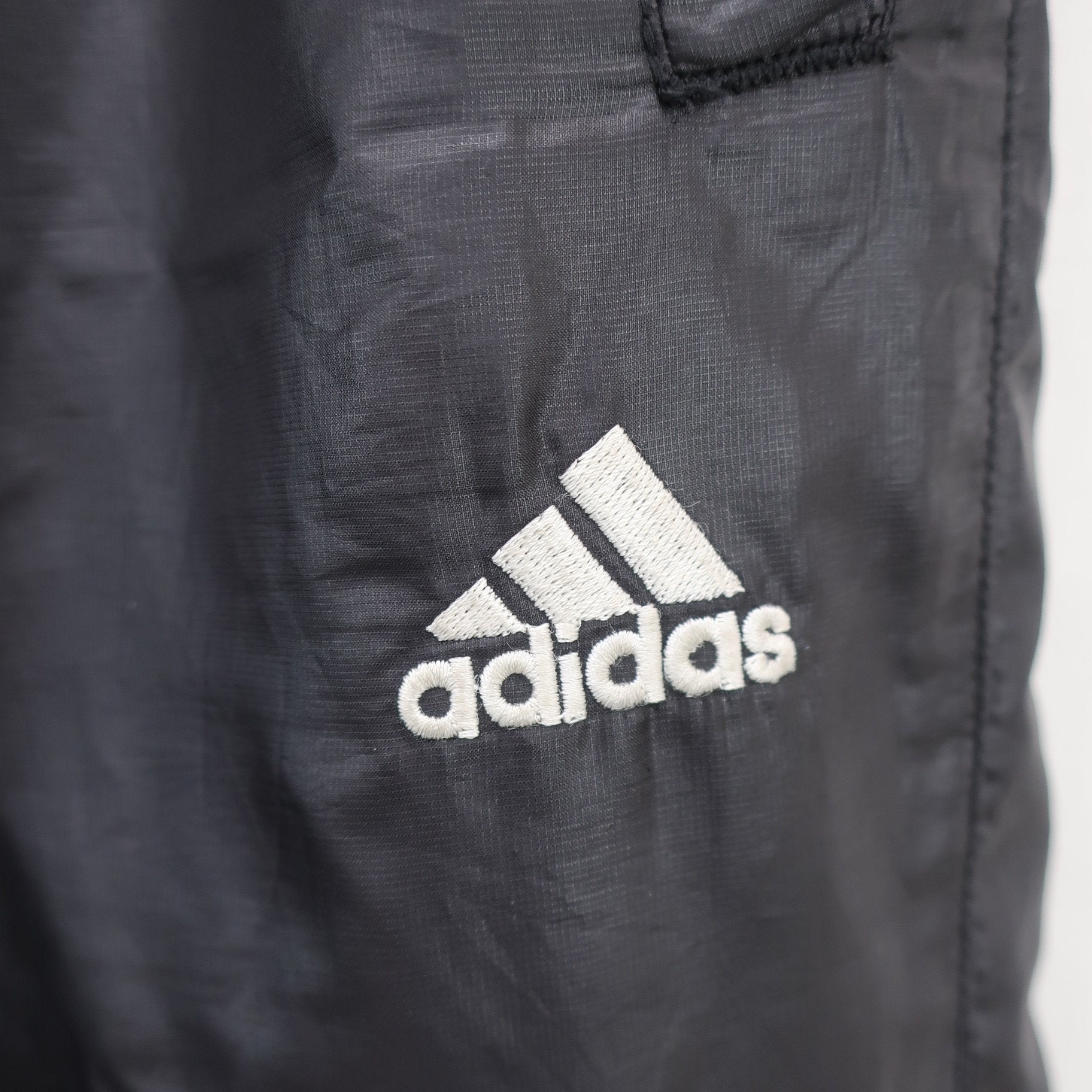adidas(アディダス) ナイロンパンツ 黒 メンズ S/P A